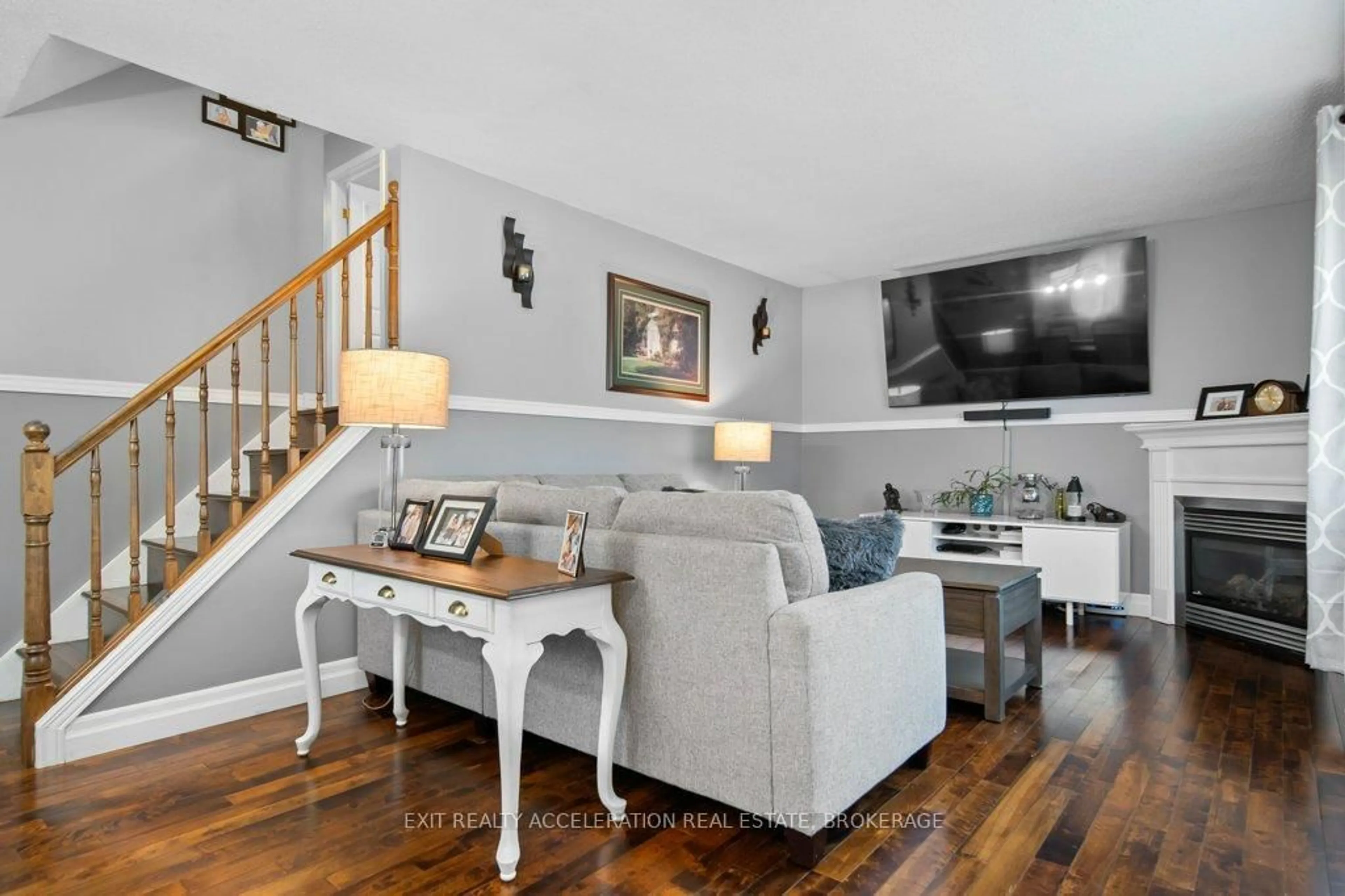 Living room with furniture, wood/laminate floor for 472 Camden Rd, Greater Napanee Ontario K7R 1G1