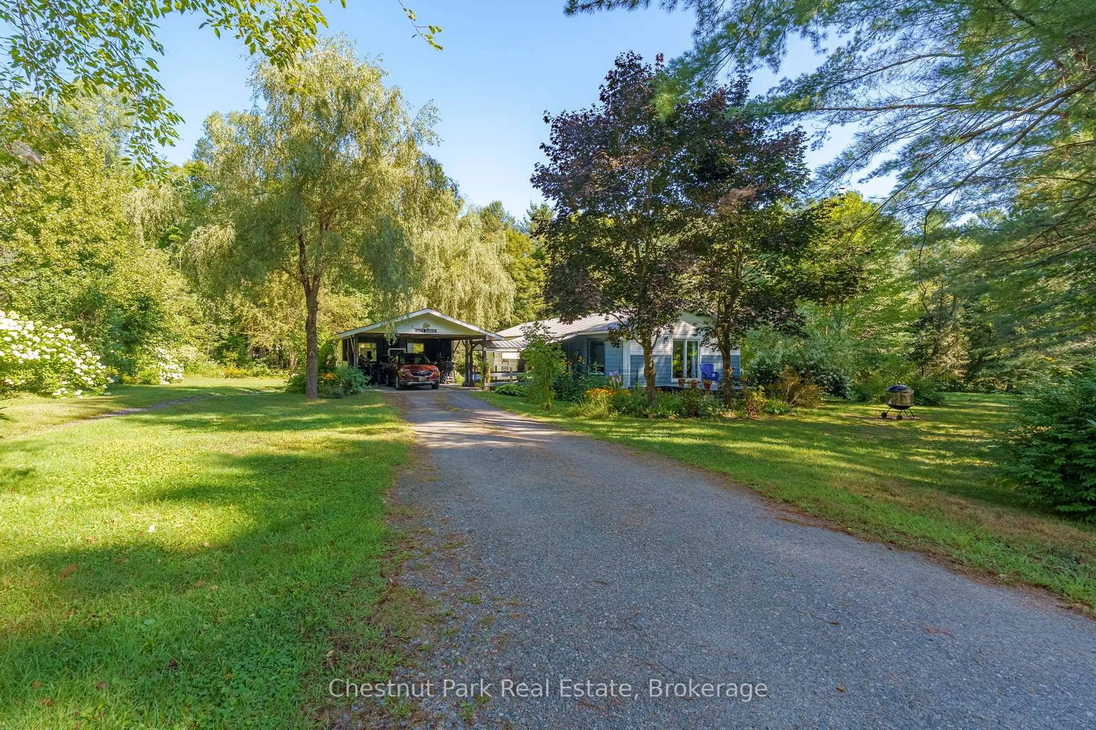 A pic from outside/outdoor area/front of a property/back of a property/a pic from drone, water/lake/river/ocean view for 1047 Naismith Rd, Bracebridge Ontario P1L 1X4