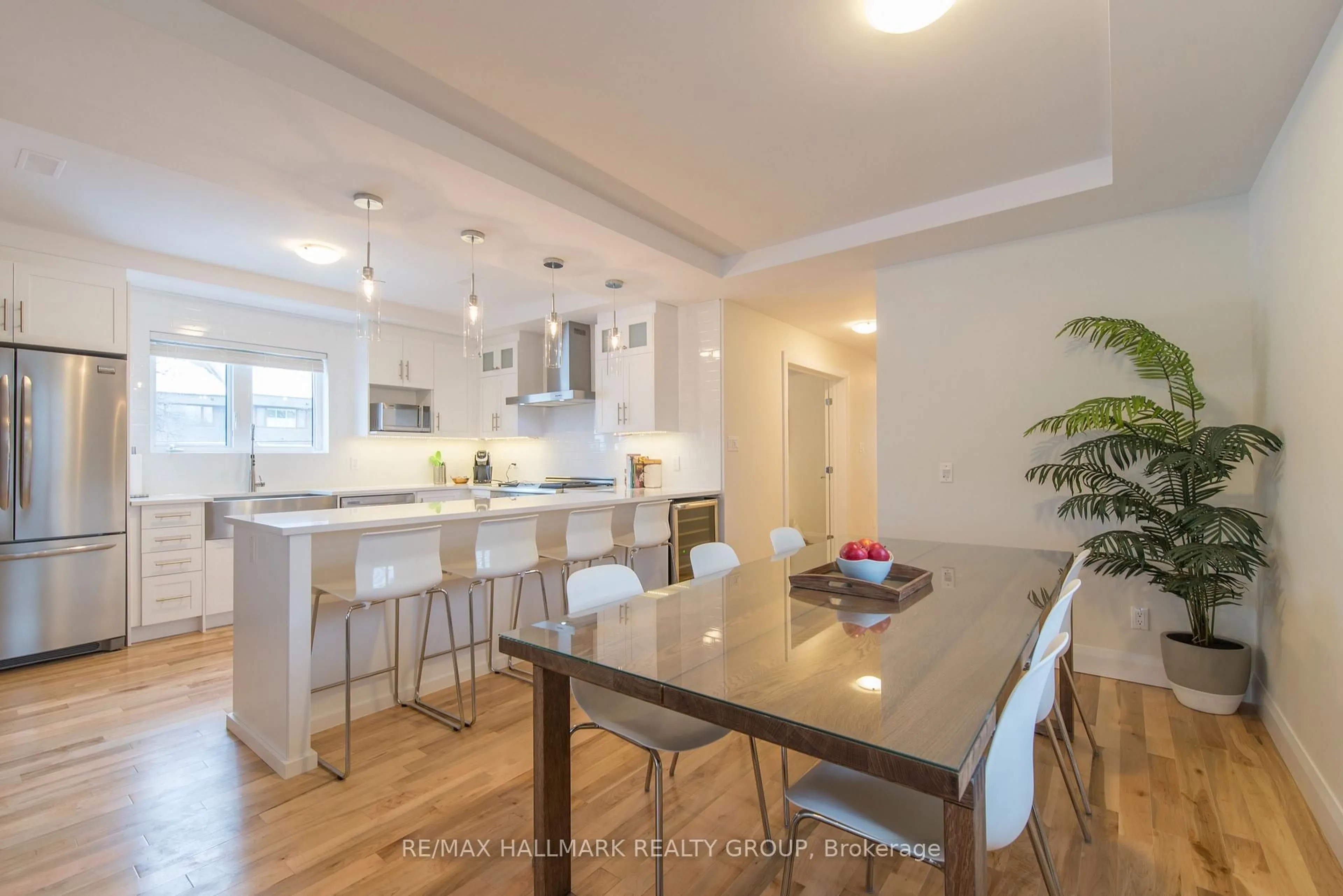Open concept kitchen, wood/laminate floor for 59 Douglas Ave, Ottawa Ontario K1M 1G3
