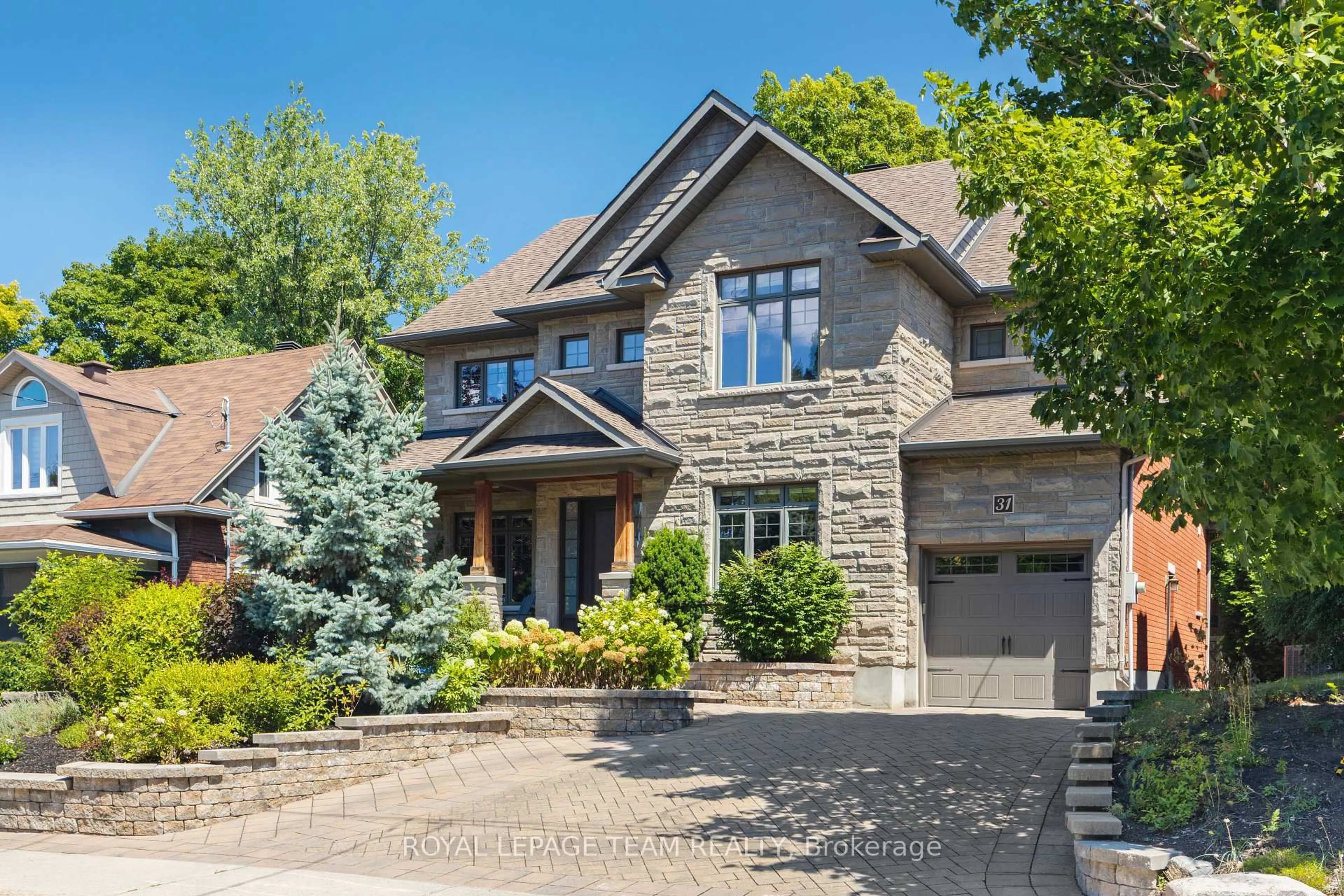 Home with brick exterior material, street for 31 Granville Ave, Ottawa Ontario K1Y 0M5