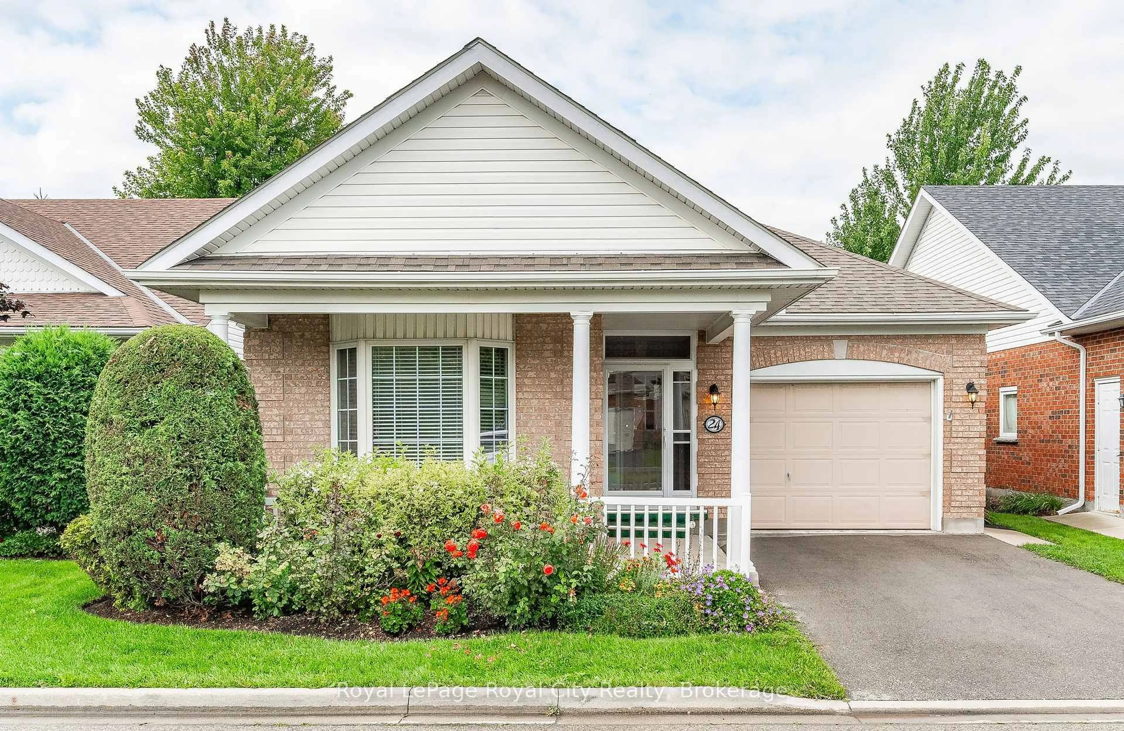 Home with brick exterior material, street for 24 Beechlawn Blvd, Guelph Ontario N1G 4X7
