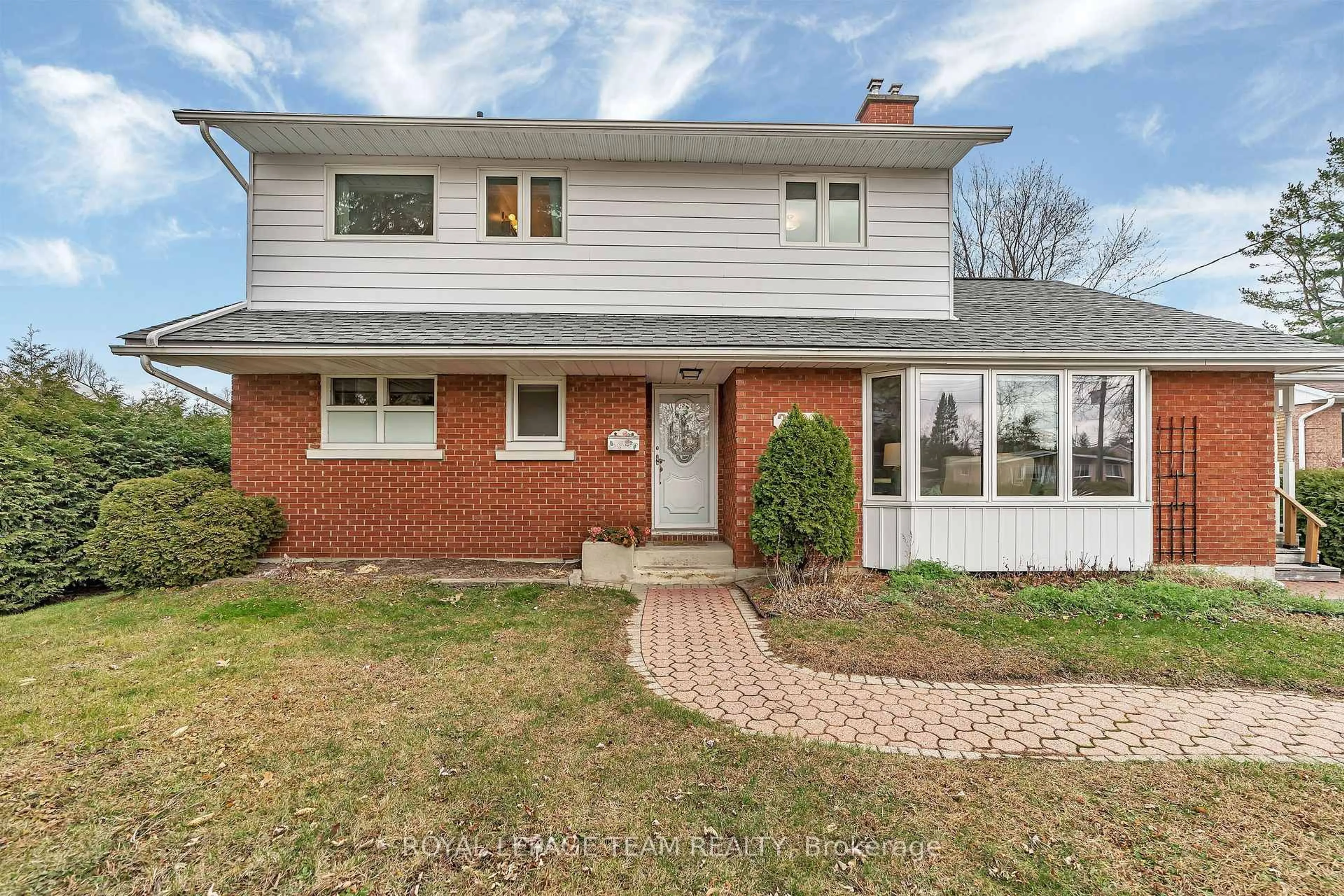 Home with brick exterior material, street for 2099 Balharrie Ave, Ottawa Ontario K1G 1G4