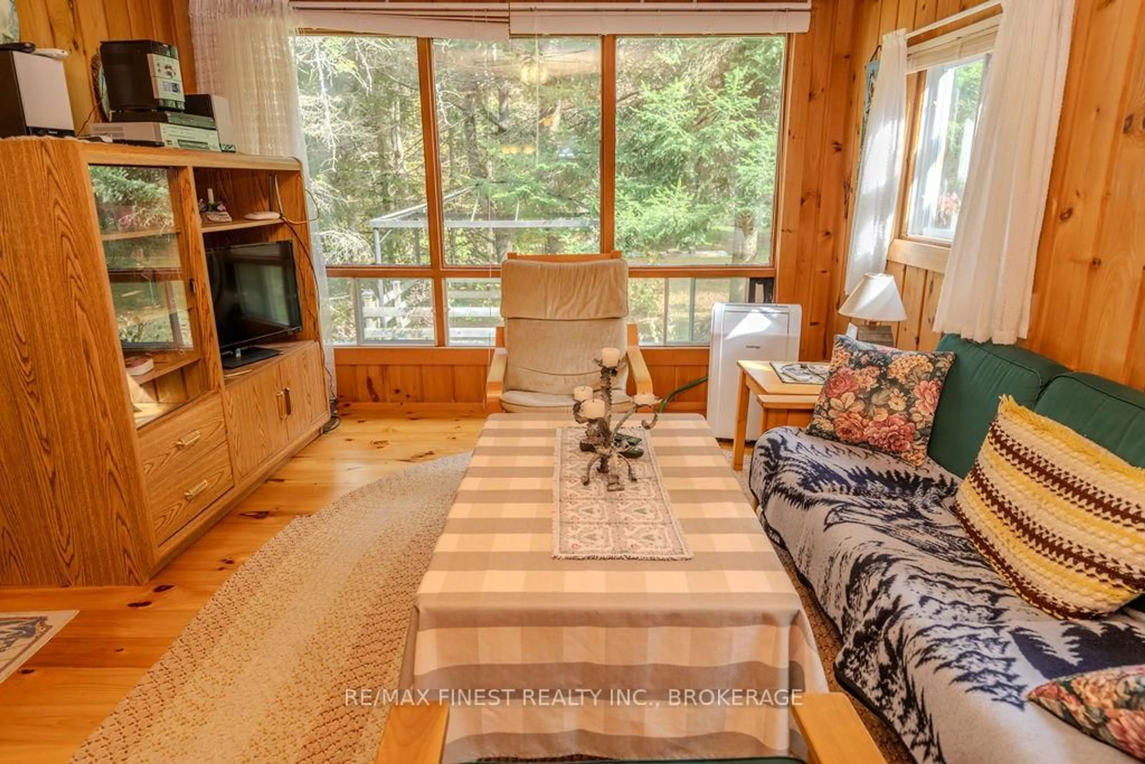 Living room with furniture, wood/laminate floor for 1203 FARM GATE Lane, Mississippi Station Ontario K0H 2C0