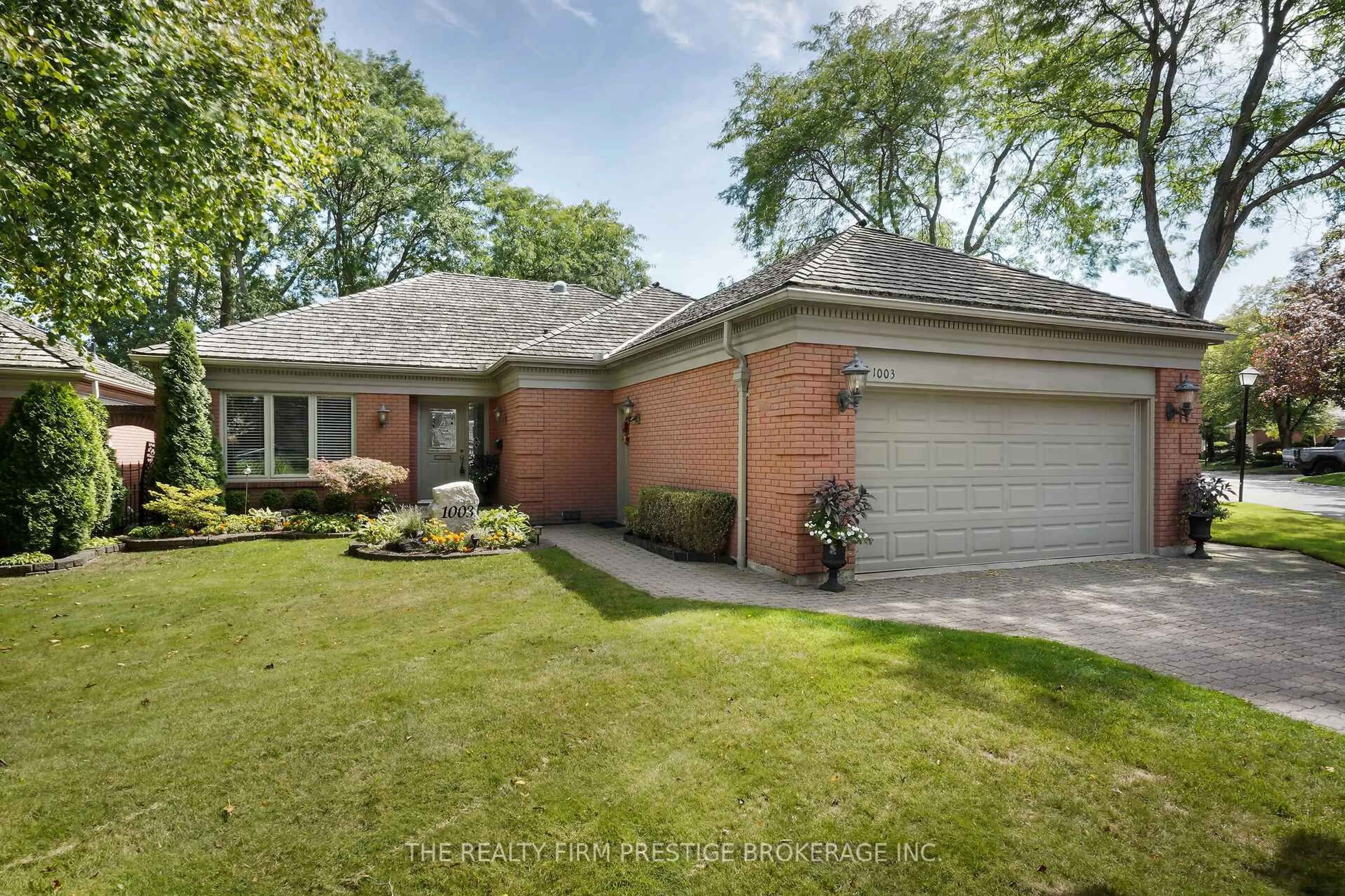 Home with brick exterior material, street for 1003 Hunt Club Mews, London North Ontario N6H 4R7