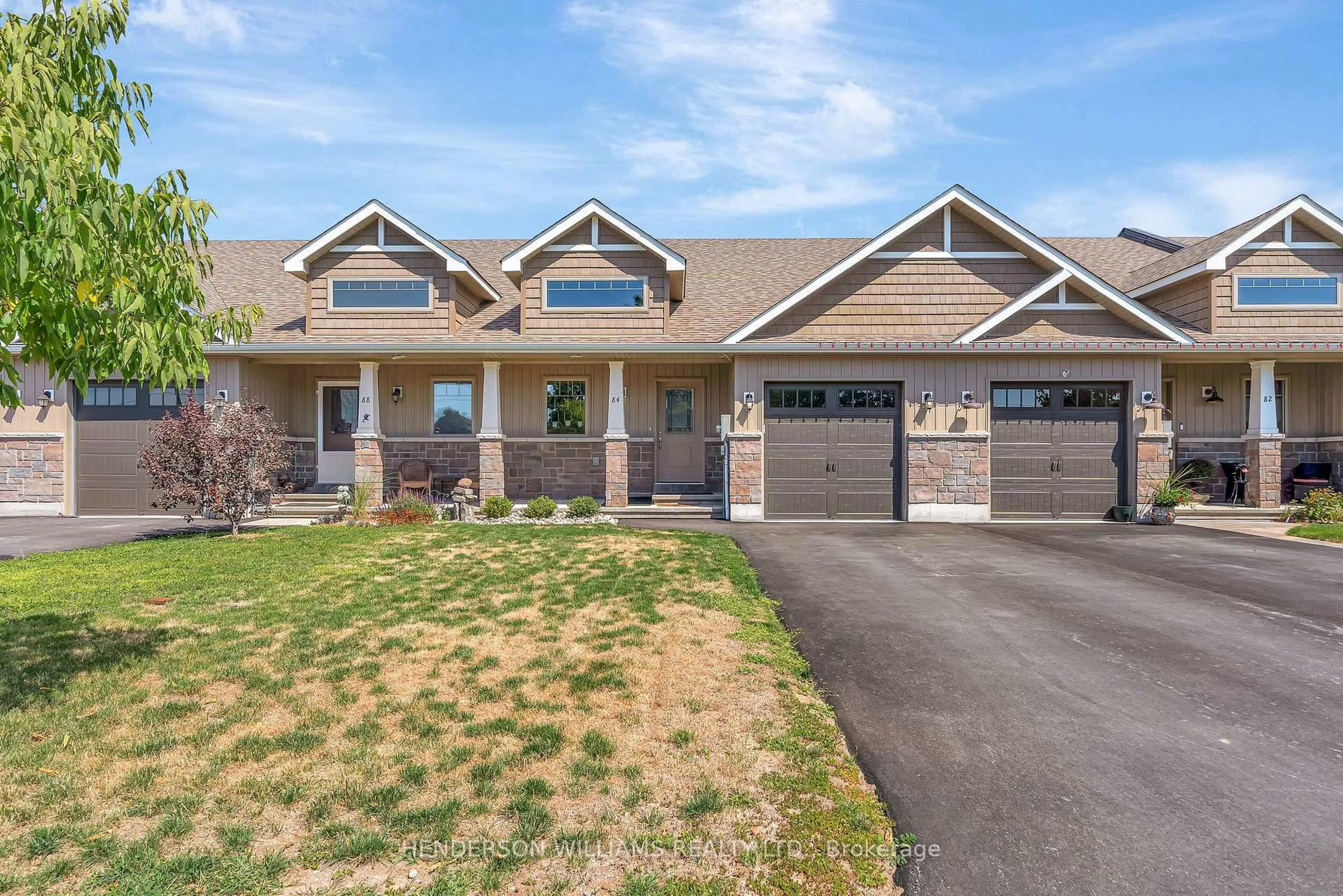 Home with brick exterior material, street for 84 Farrington Cres, Prince Edward County Ontario K0K 2T0