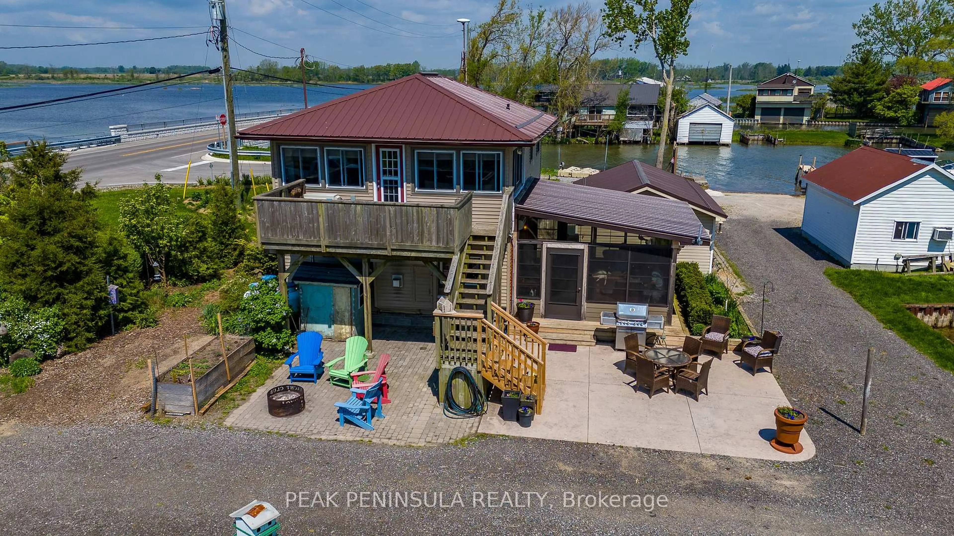 A pic from outside/outdoor area/front of a property/back of a property/a pic from drone, water/lake/river/ocean view for 864 59 Highway, Norfolk Ontario N0E 1M0