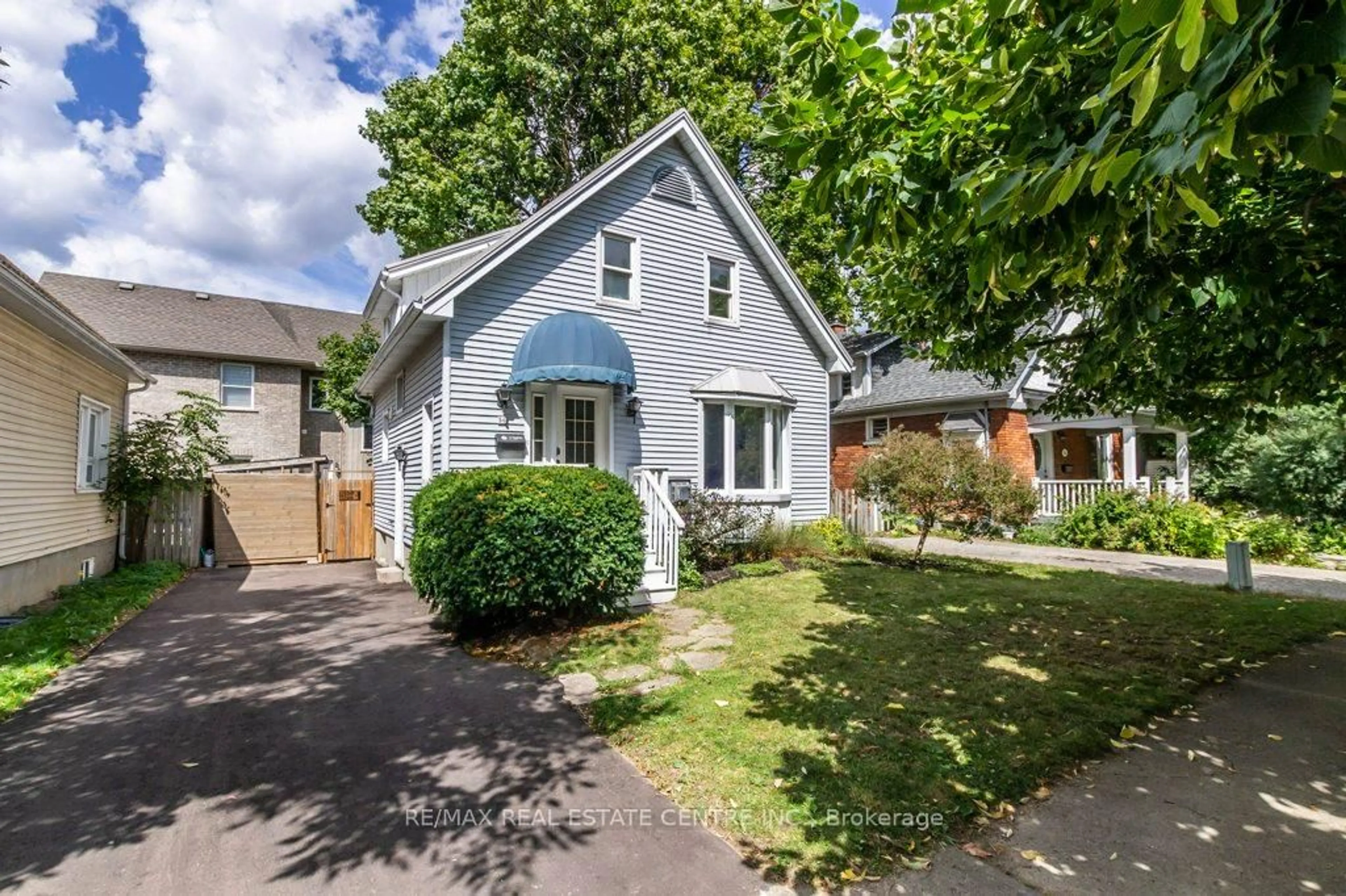 A pic from outside/outdoor area/front of a property/back of a property/a pic from drone, street for 56 John St, Waterloo Ontario N2L 1B4