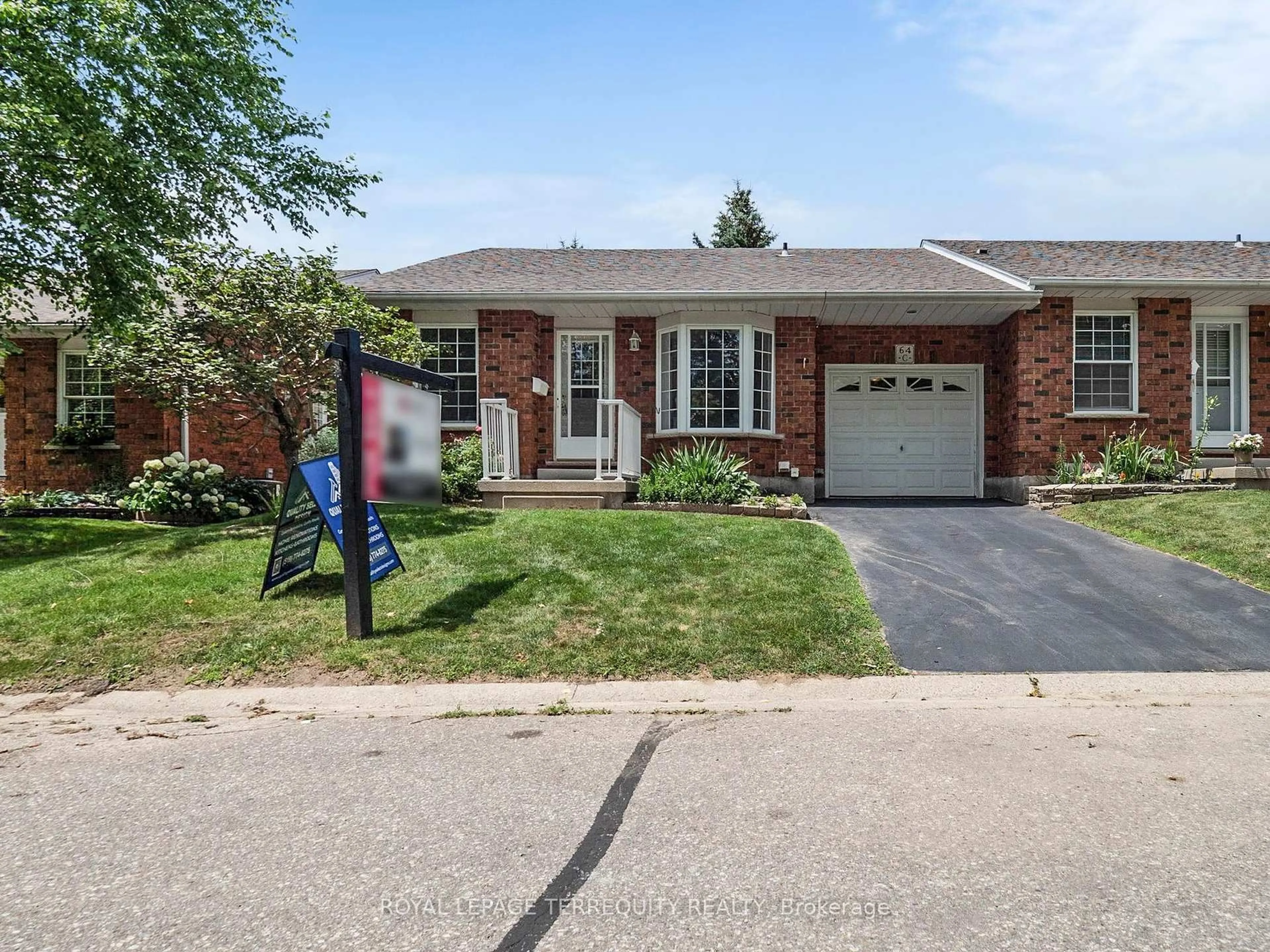 Home with brick exterior material, street for 64C Harris Ave, Brantford Ontario N3R 2E9