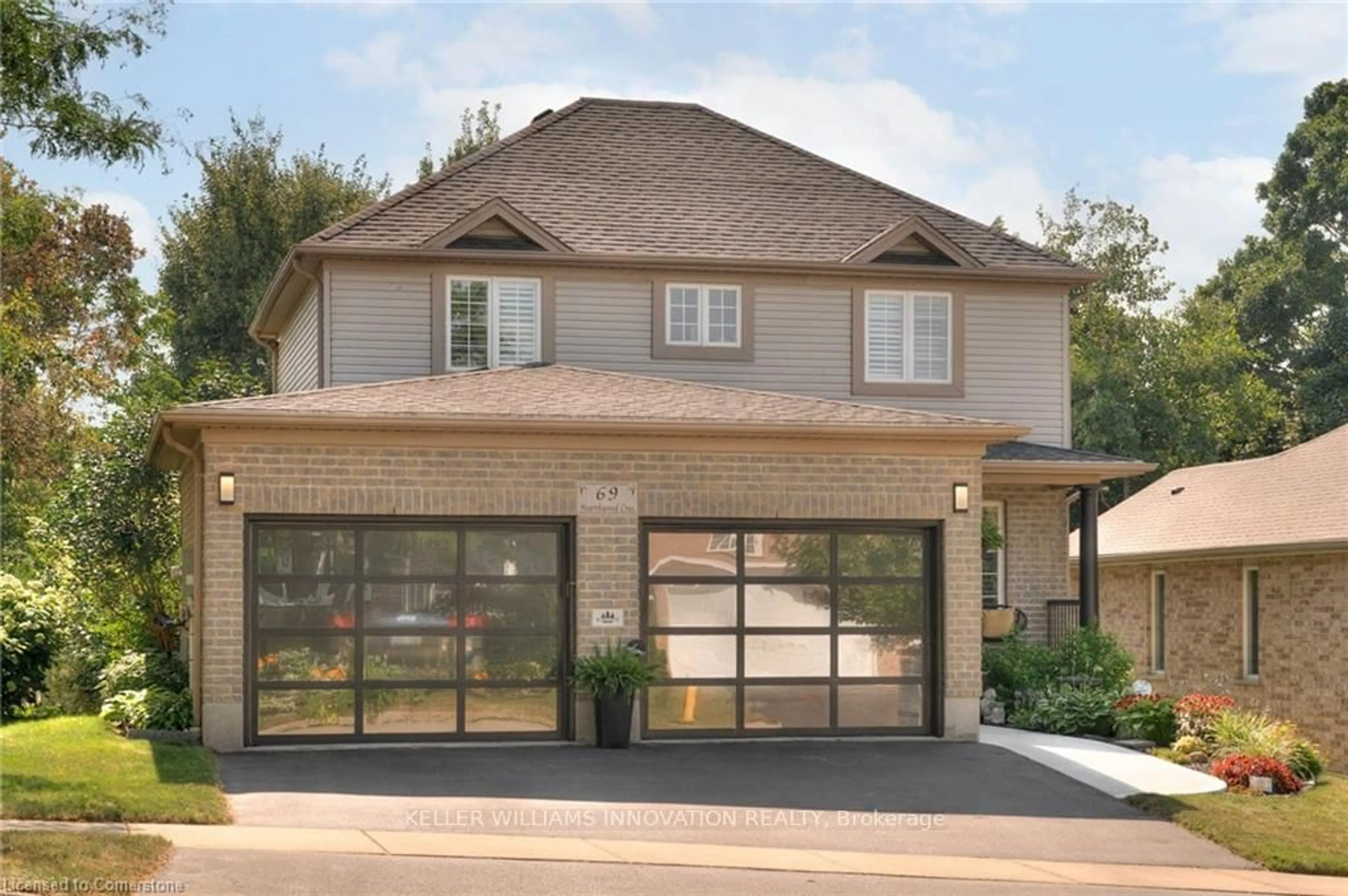 Home with brick exterior material, street for 69 Hearthwood Cres, Kitchener Ontario N2R 1K6