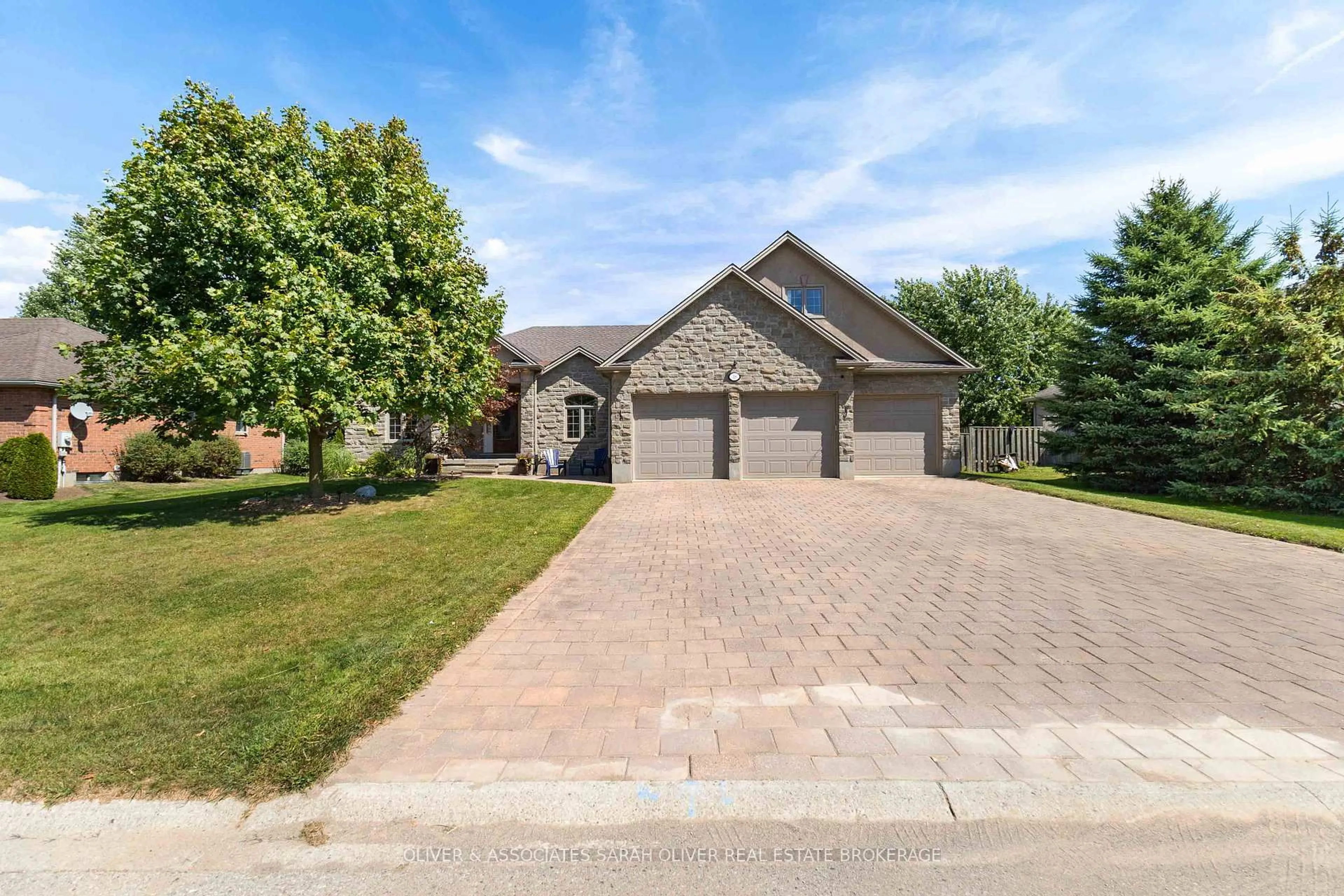 Home with brick exterior material, street for 18 Highland St, Middlesex Centre Ontario N0L 1E0