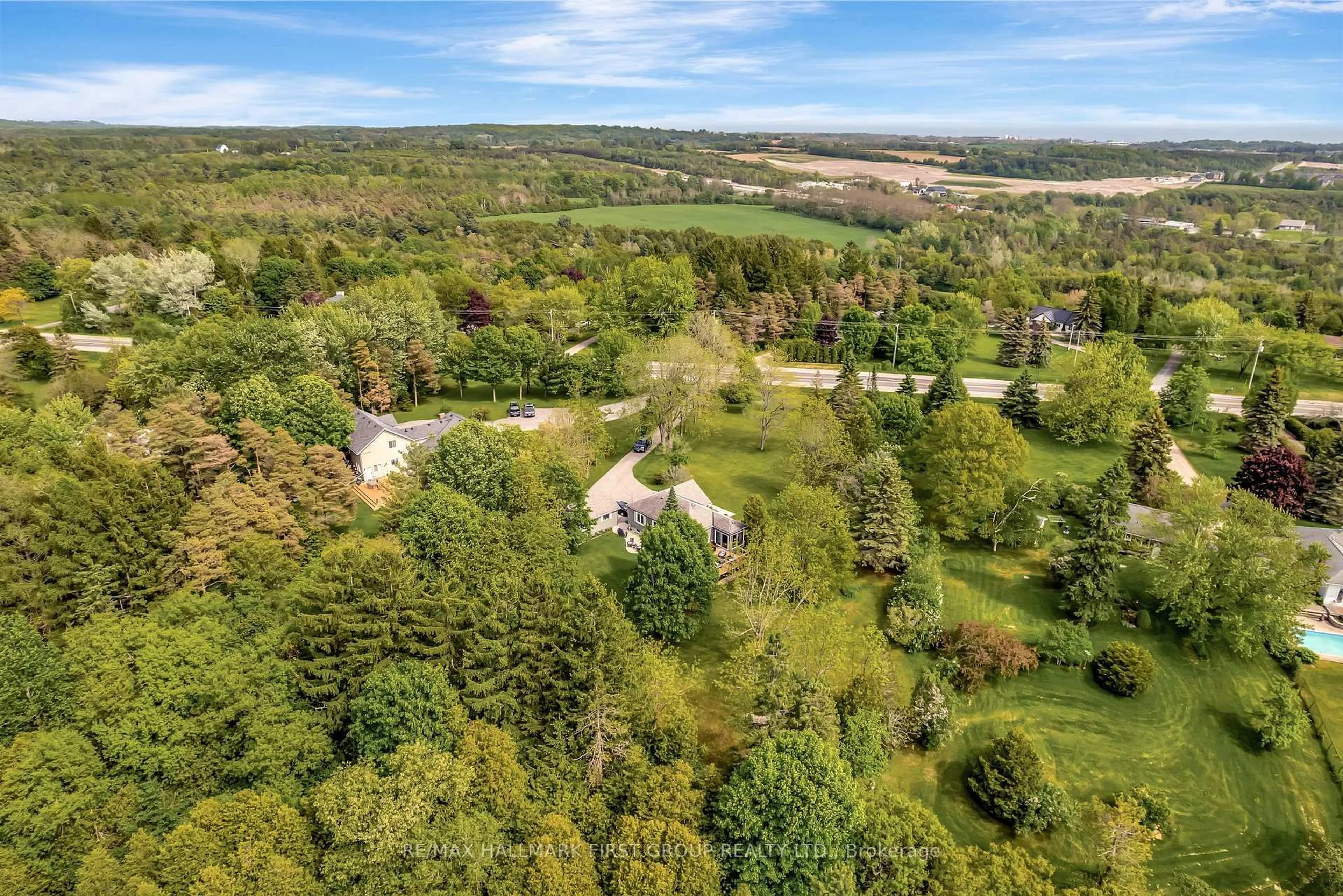 A pic from outside/outdoor area/front of a property/back of a property/a pic from drone, forest/trees view for 4248 County Road 45, Cobourg Ontario K9A 0X2