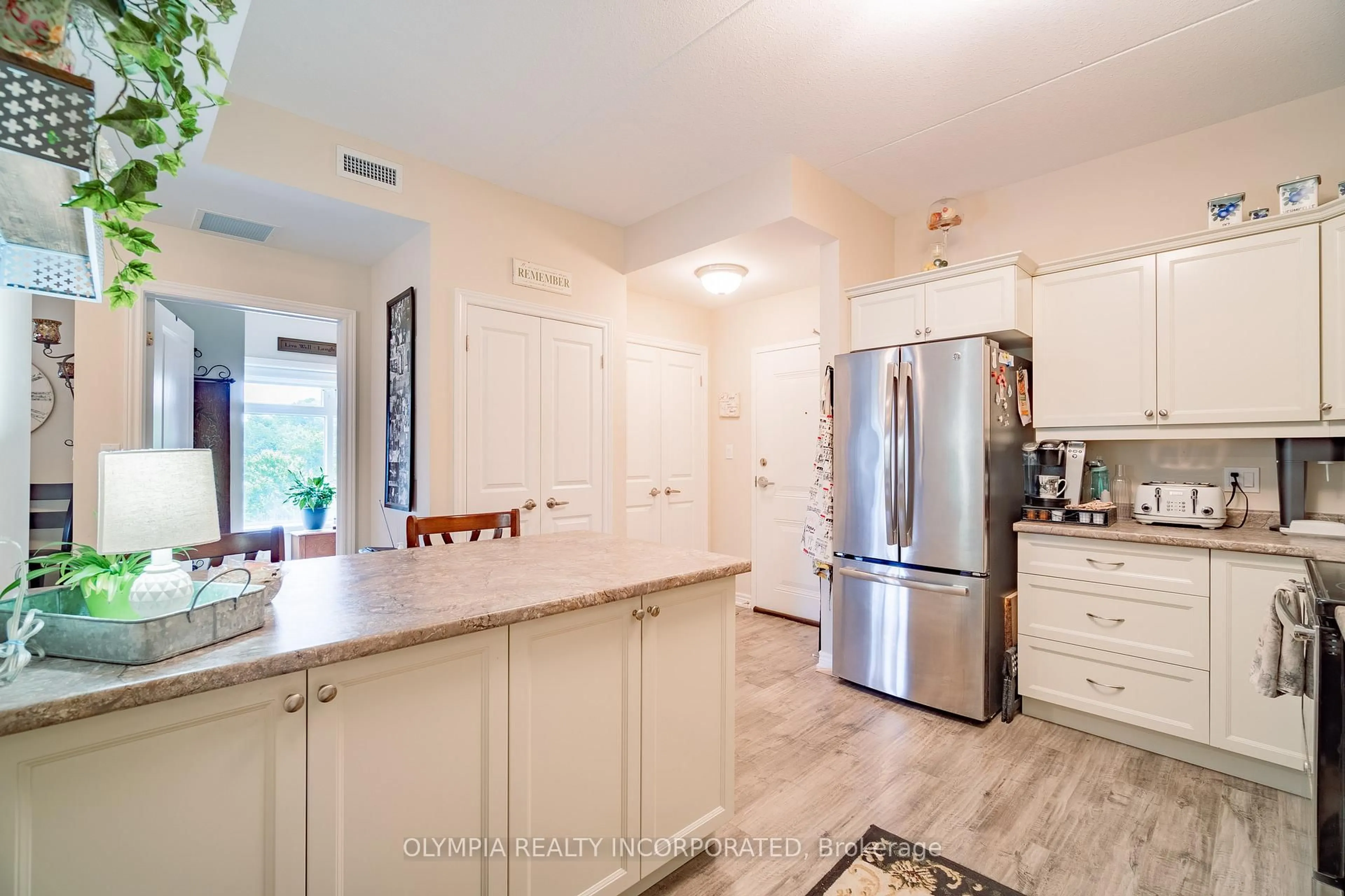 Open concept kitchen, ceramic/tile floor for 4644 Pettit Ave #316, Niagara Falls Ontario L2E 0B4