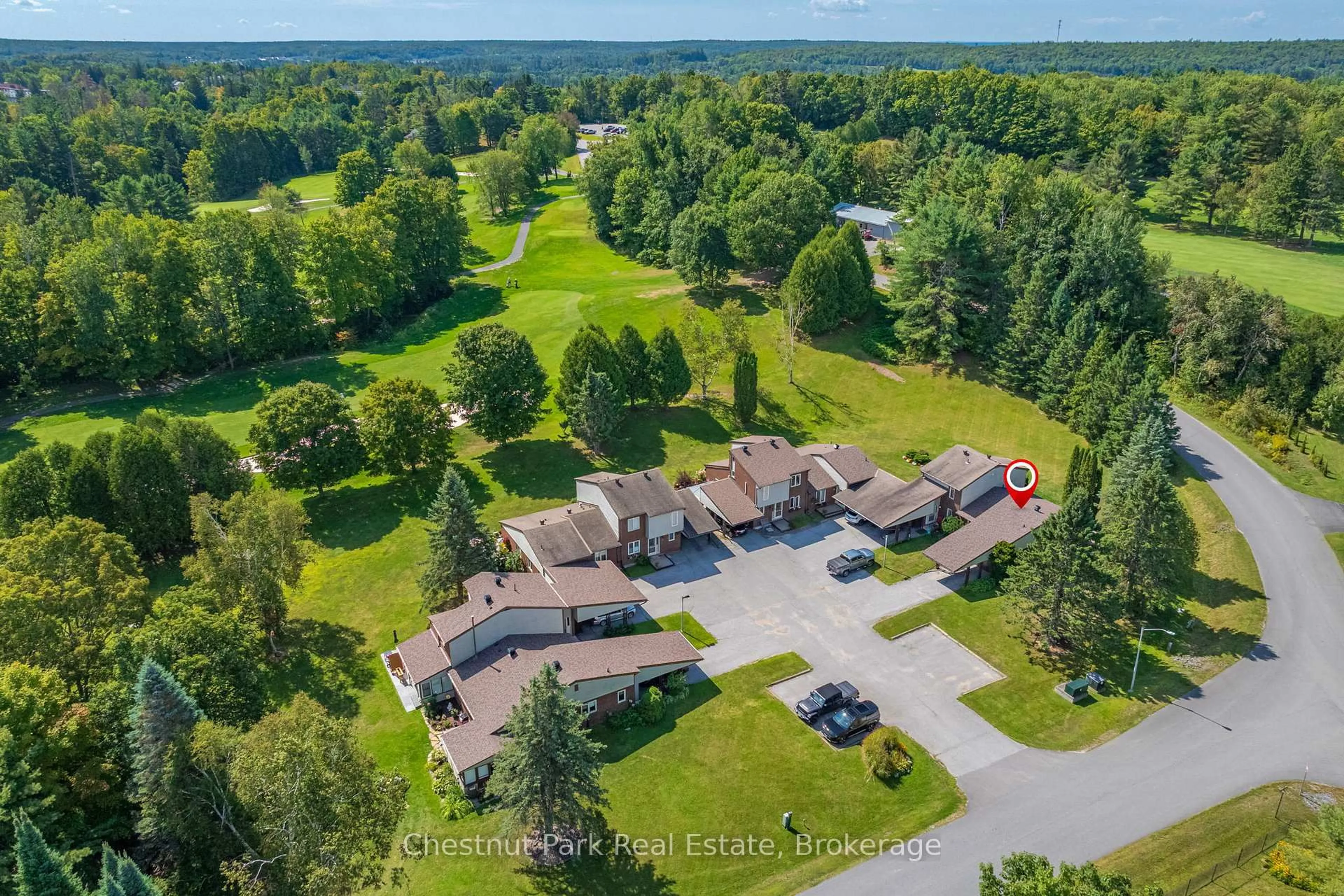 A pic from outside/outdoor area/front of a property/back of a property/a pic from drone, unknown for 15 Golf Course Rd #8, Bracebridge Ontario P1L 1M7