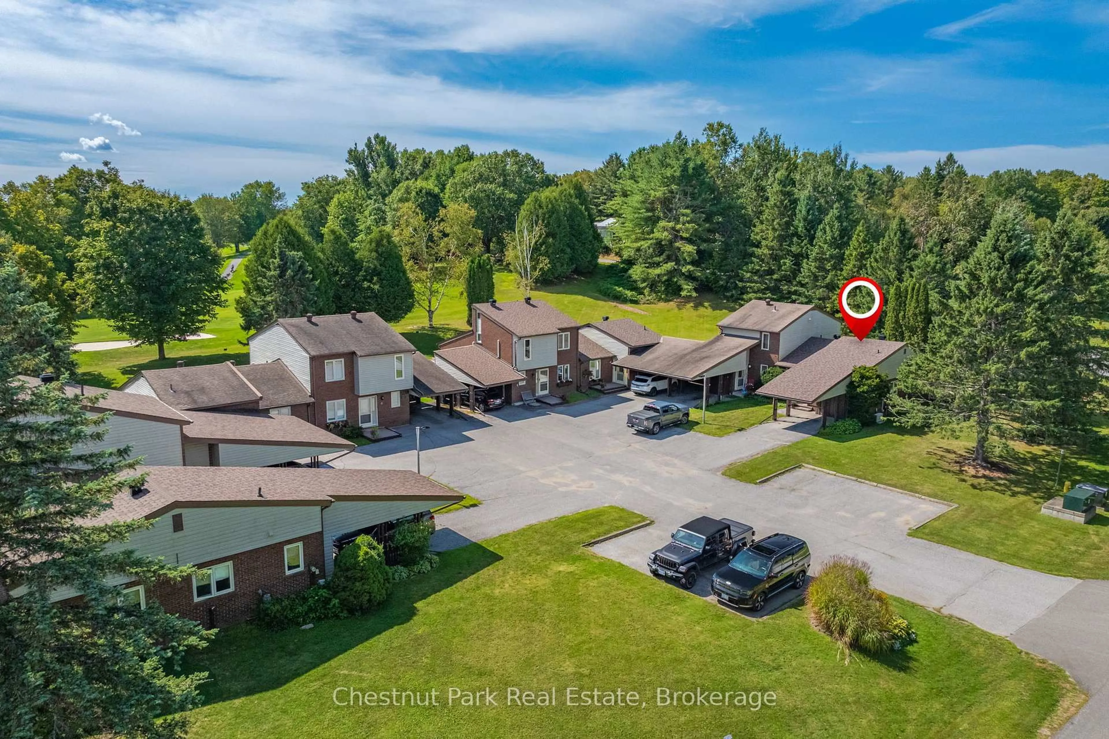 A pic from outside/outdoor area/front of a property/back of a property/a pic from drone, unknown for 15 Golf Course Rd #8, Bracebridge Ontario P1L 1M7