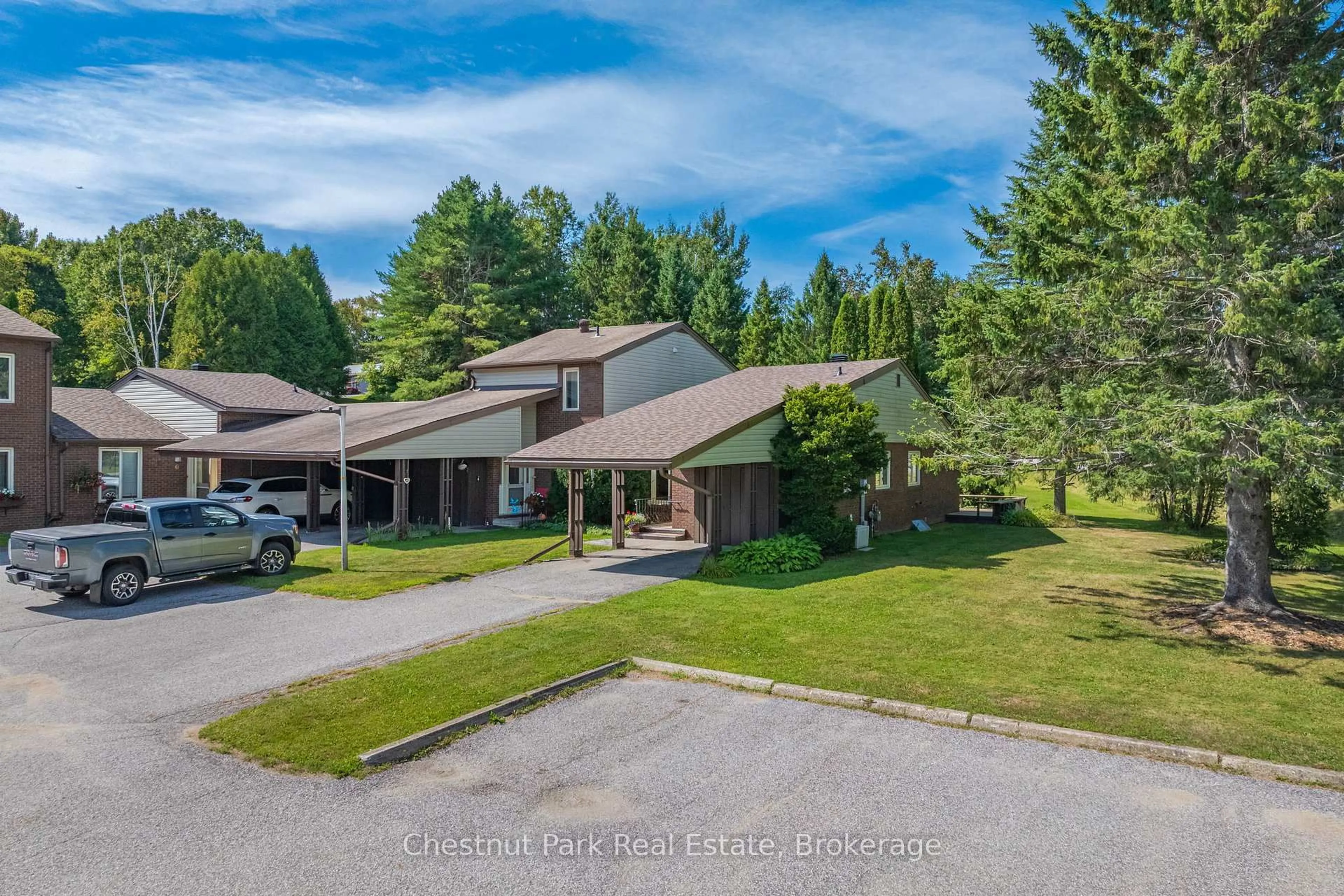 A pic from outside/outdoor area/front of a property/back of a property/a pic from drone, mountain view for 15 Golf Course Rd #8, Bracebridge Ontario P1L 1M7