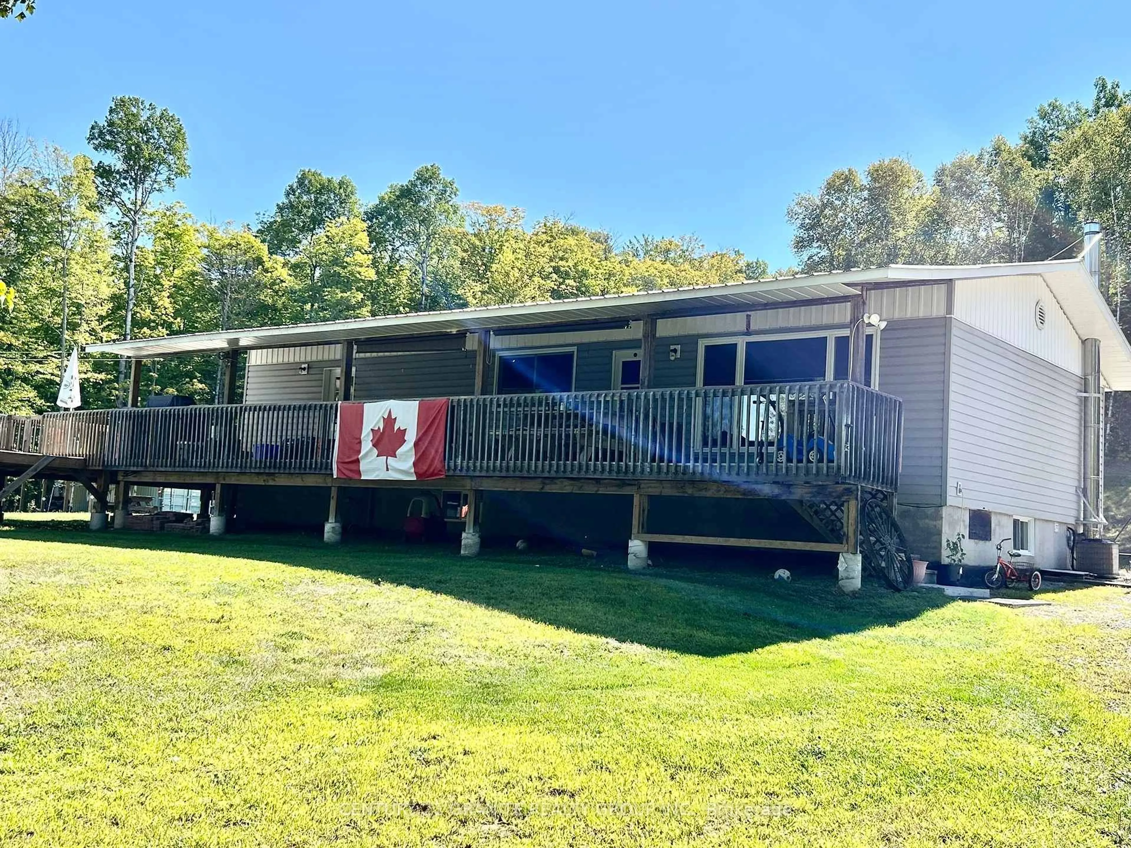 A pic from outside/outdoor area/front of a property/back of a property/a pic from drone, water/lake/river/ocean view for 1561 South Baptiste Lake Rd, Bancroft Ontario K0L 1C0