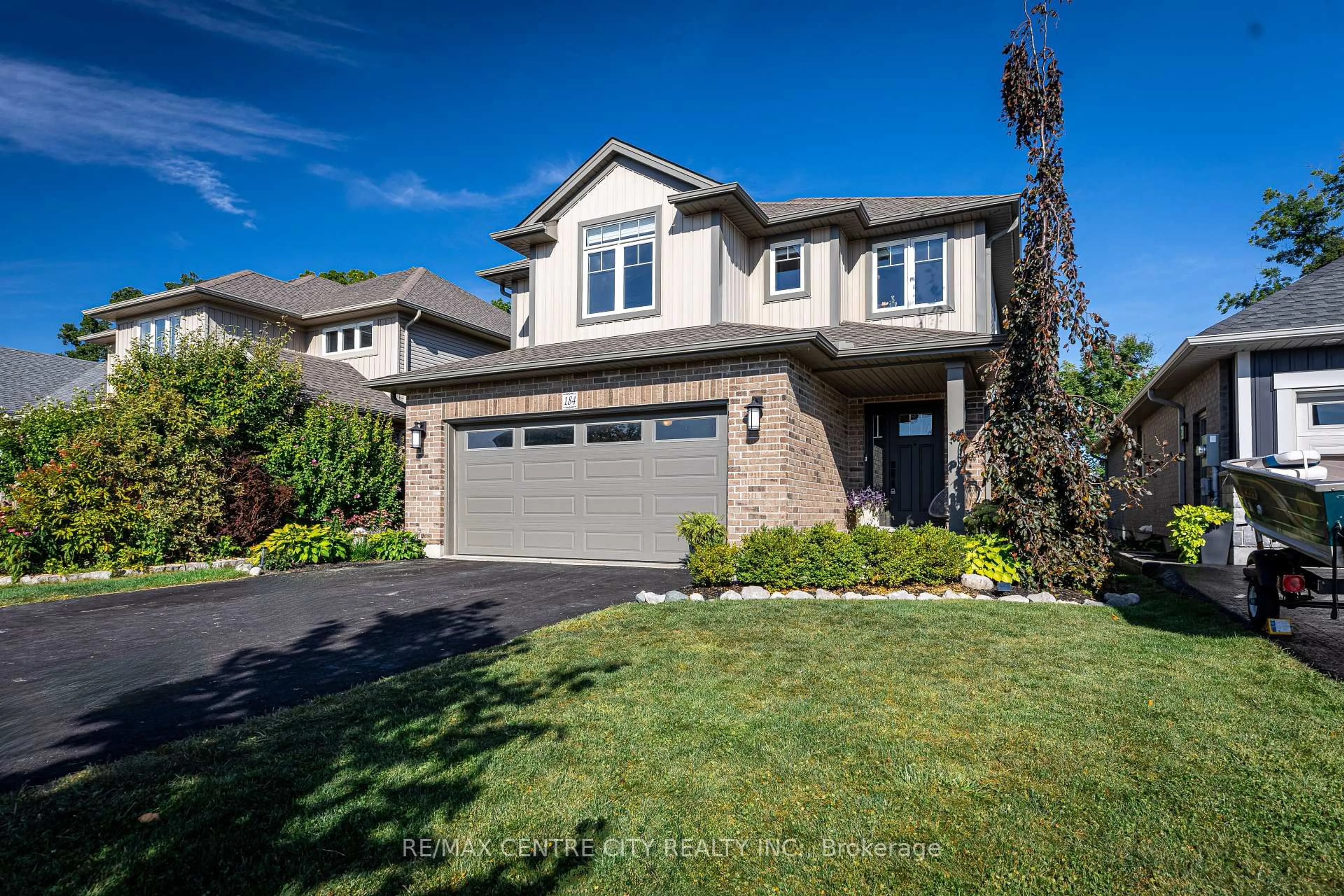 Home with vinyl exterior material, street for 184 Emery St, Central Elgin Ontario N5L 1H5