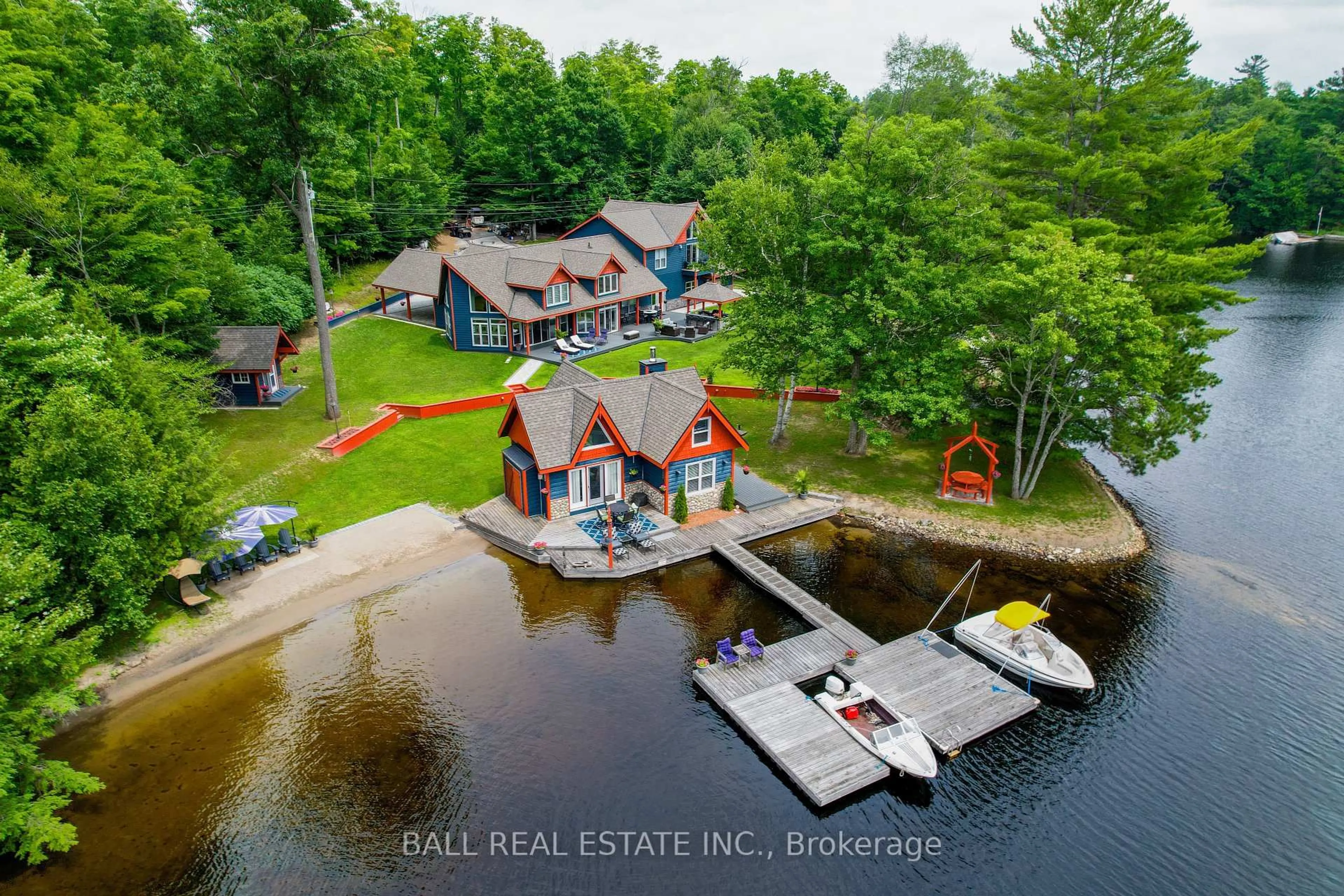 A pic from outside/outdoor area/front of a property/back of a property/a pic from drone, water/lake/river/ocean view for 33 Fire Route 210, Trent Lakes Ontario K0L 1J0