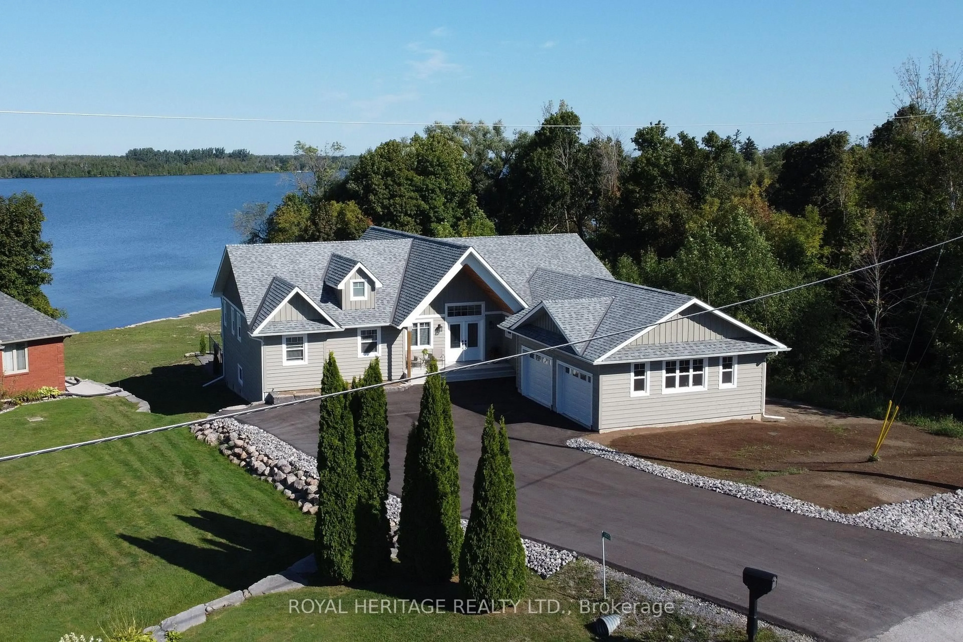 A pic from outside/outdoor area/front of a property/back of a property/a pic from drone, water/lake/river/ocean view for 1470 Pebble Beach Rd, Selwyn Ontario K9J 6X5