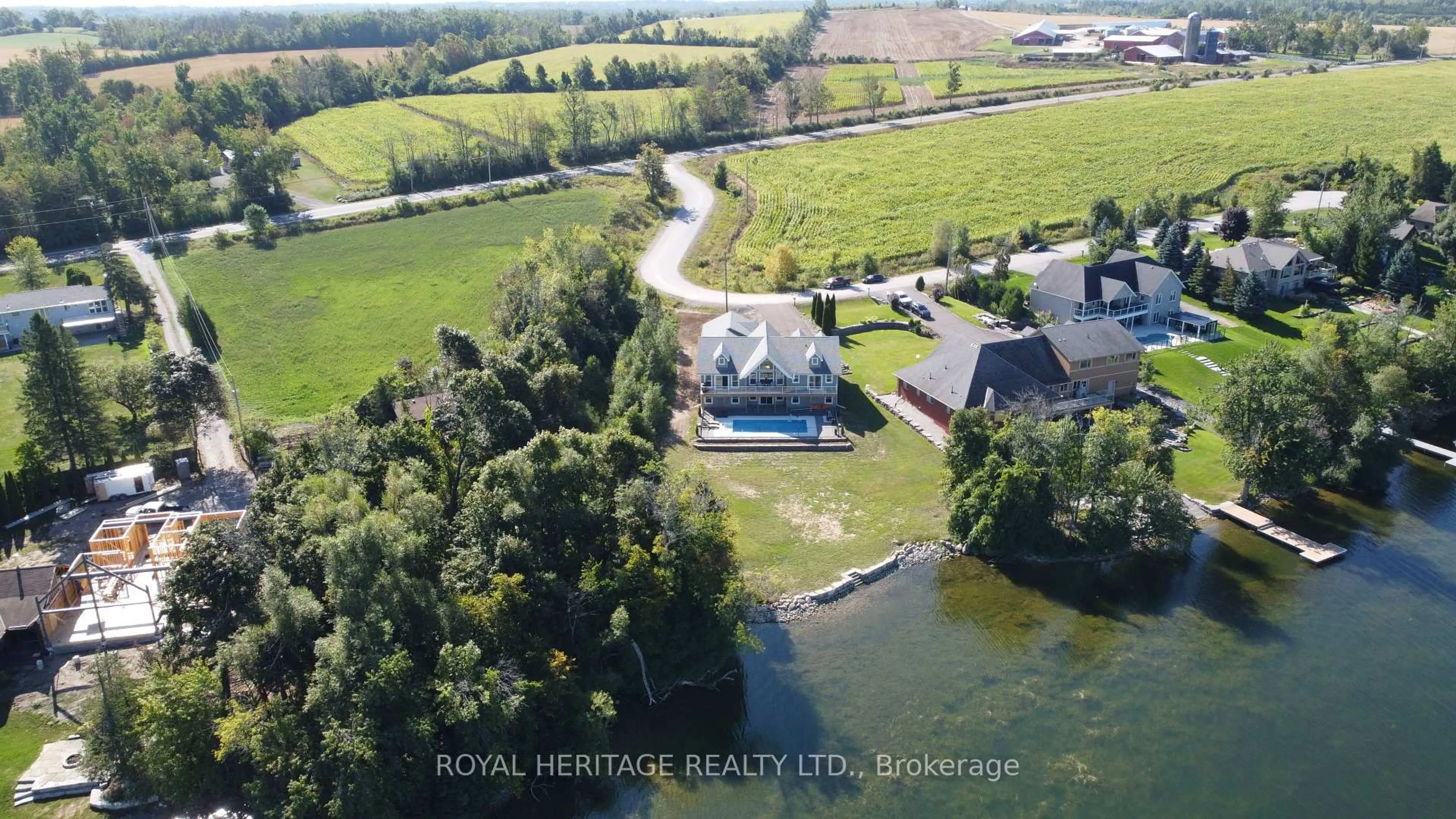 A pic from outside/outdoor area/front of a property/back of a property/a pic from drone, water/lake/river/ocean view for 1470 Pebble Beach Rd, Selwyn Ontario K9J 6X5