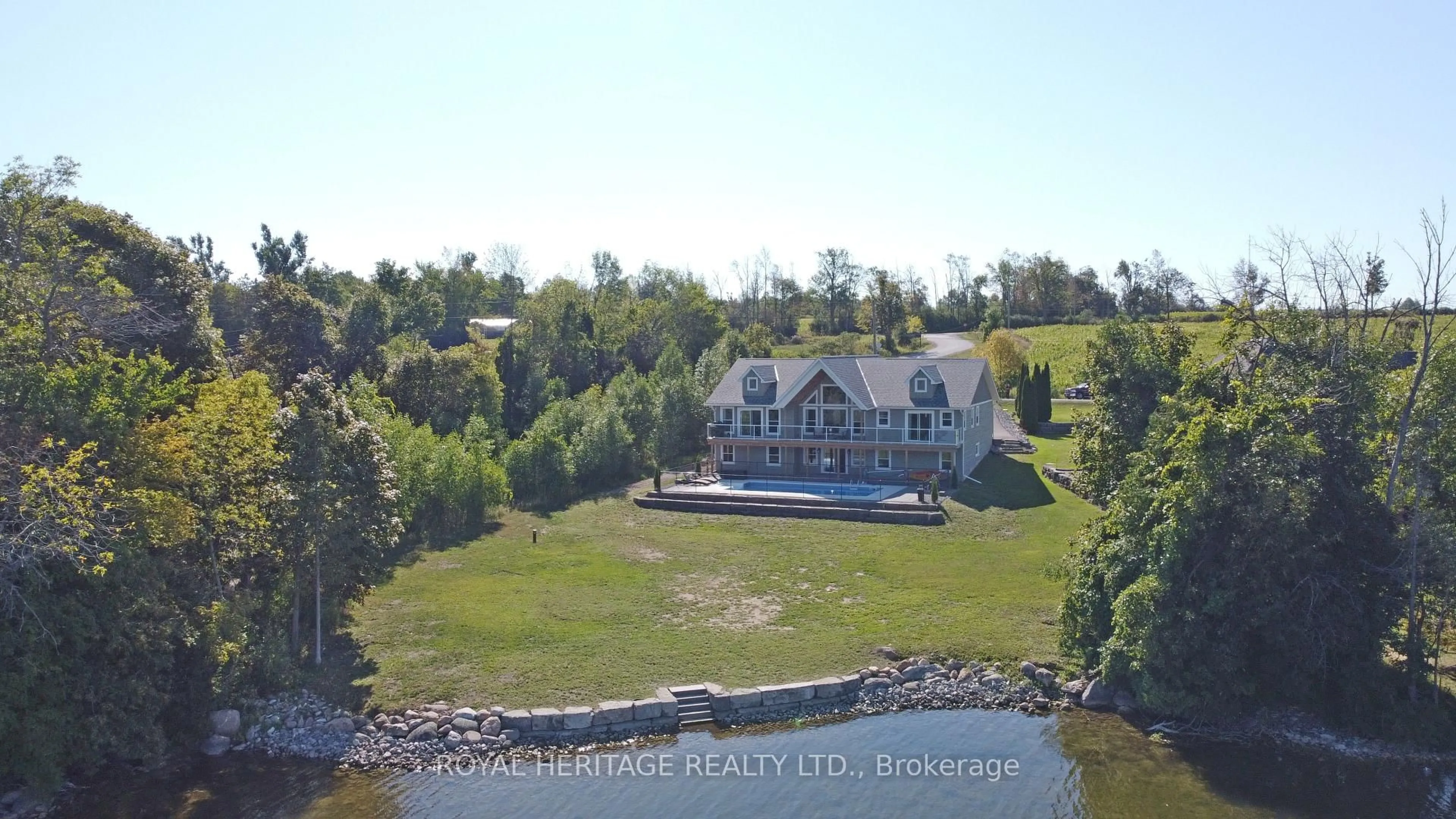 A pic from outside/outdoor area/front of a property/back of a property/a pic from drone, water/lake/river/ocean view for 1470 Pebble Beach Rd, Selwyn Ontario K9J 6X5