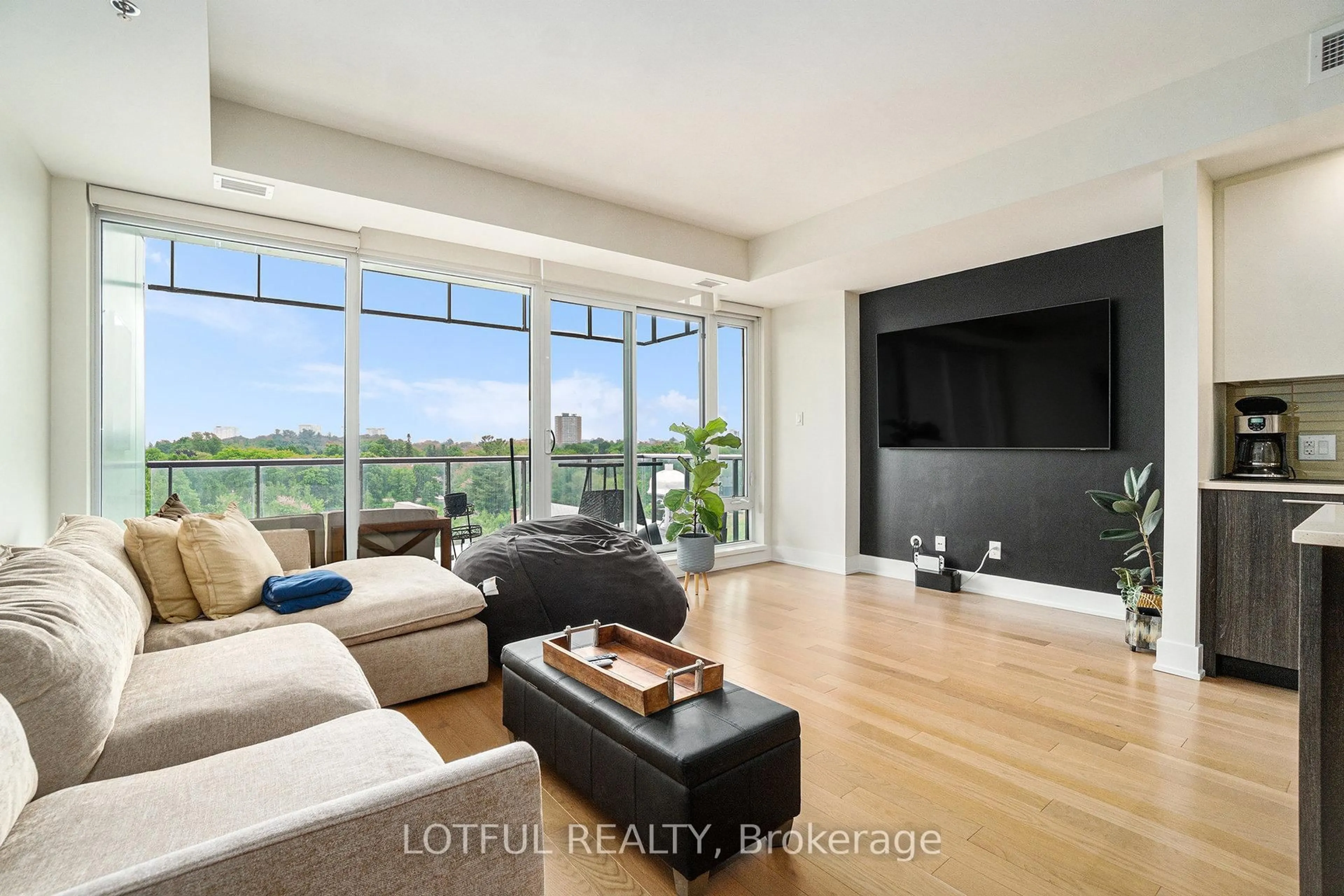Living room with furniture, unknown for 98 Richmond Rd #701, Ottawa Ontario K1Z 0B2