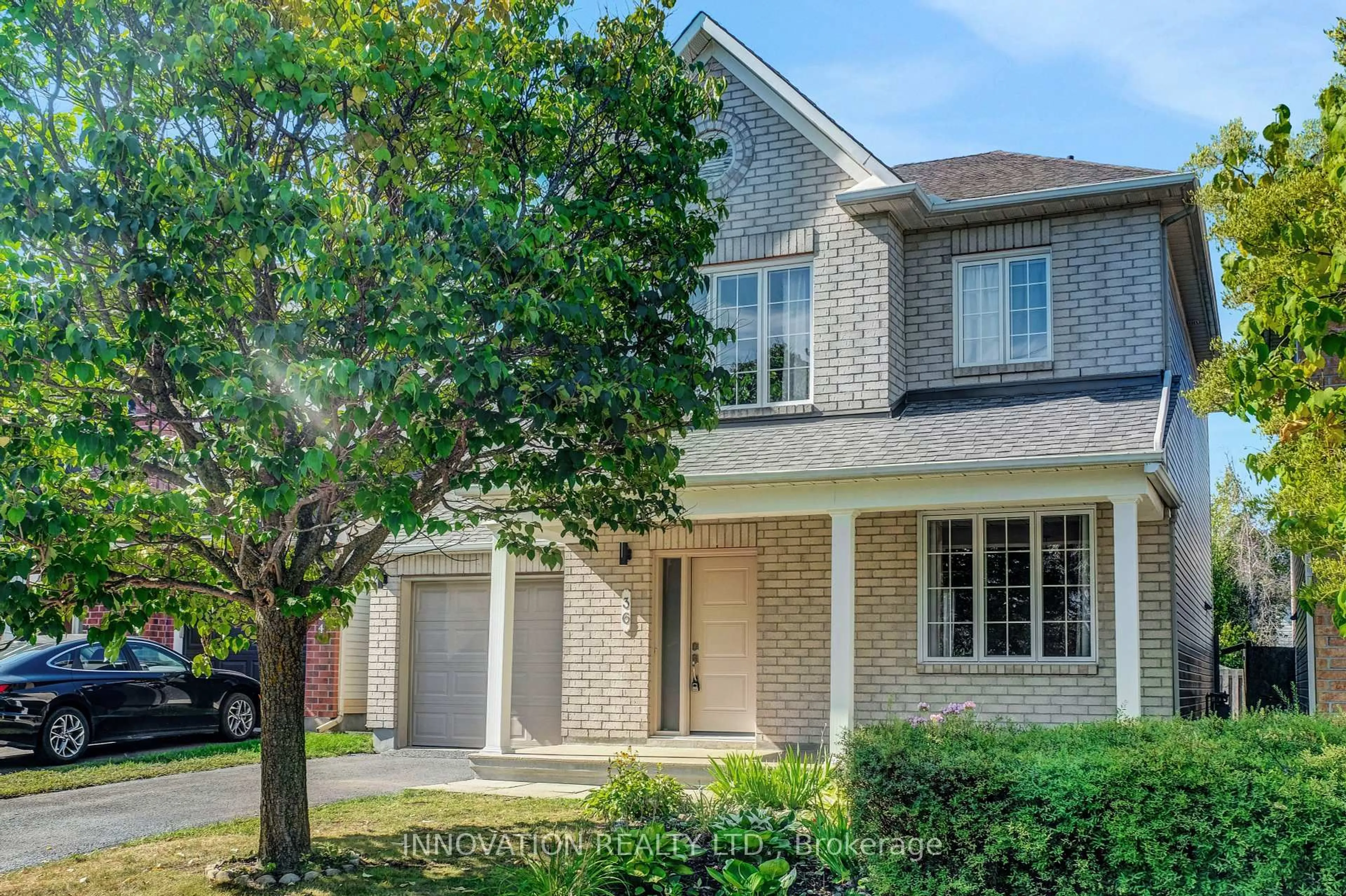 Home with brick exterior material, street for 36 Mersey Dr, Ottawa Ontario K2K 3A7