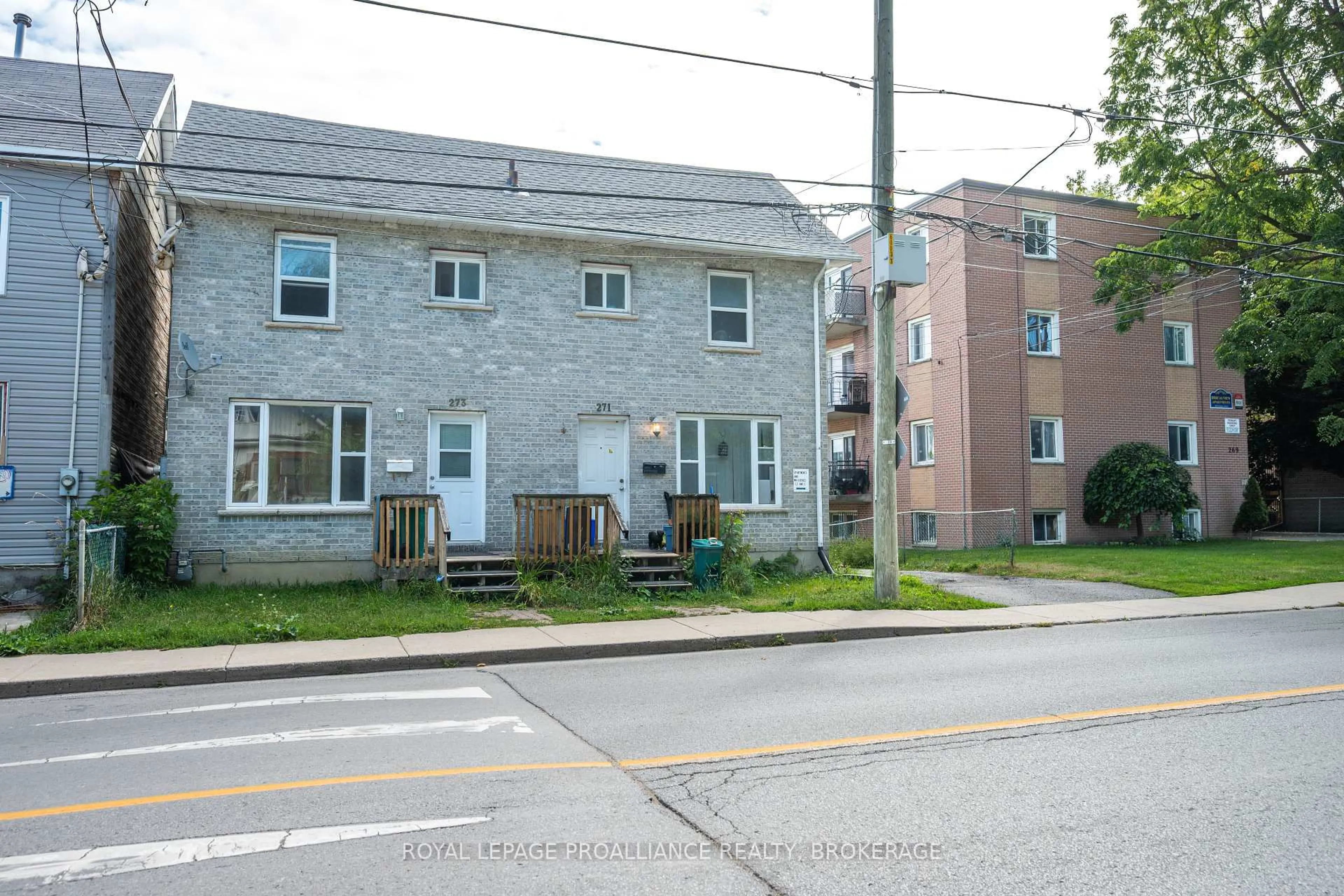 A pic from outside/outdoor area/front of a property/back of a property/a pic from drone, street for 271-273 Rideau St, Kingston Ontario K7K 3A7