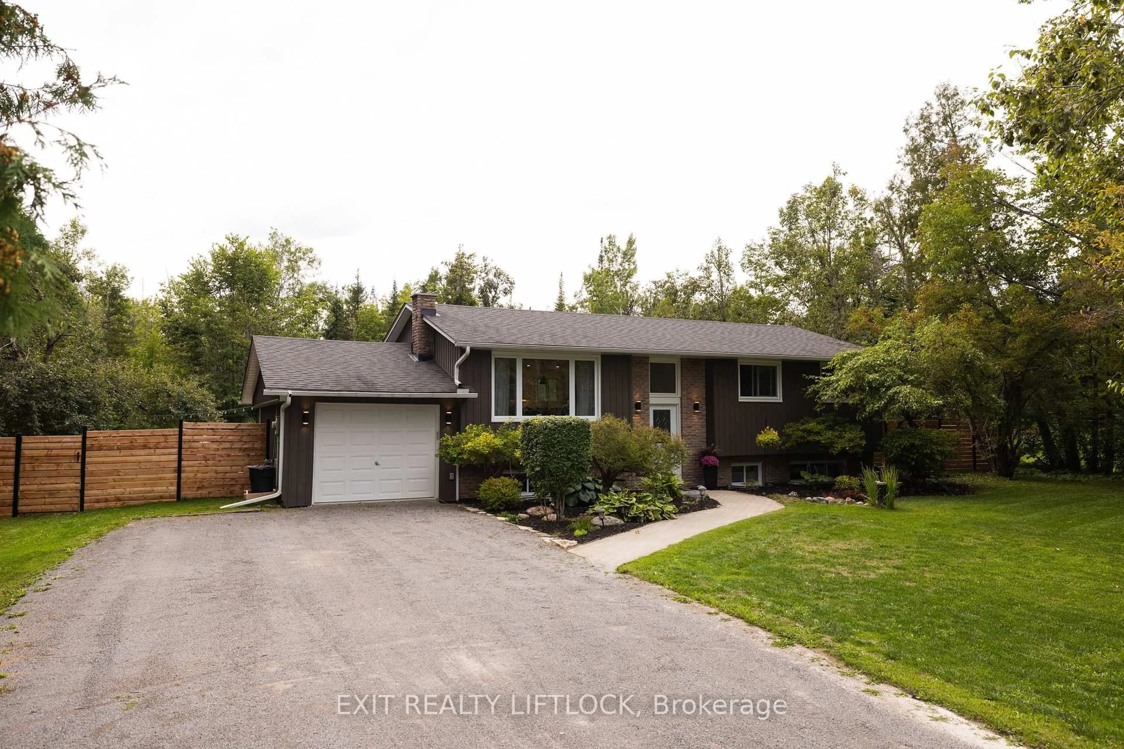 Home with vinyl exterior material, street for 47 Emily Manor Dr, Kawartha Lakes Ontario K0L 2W0