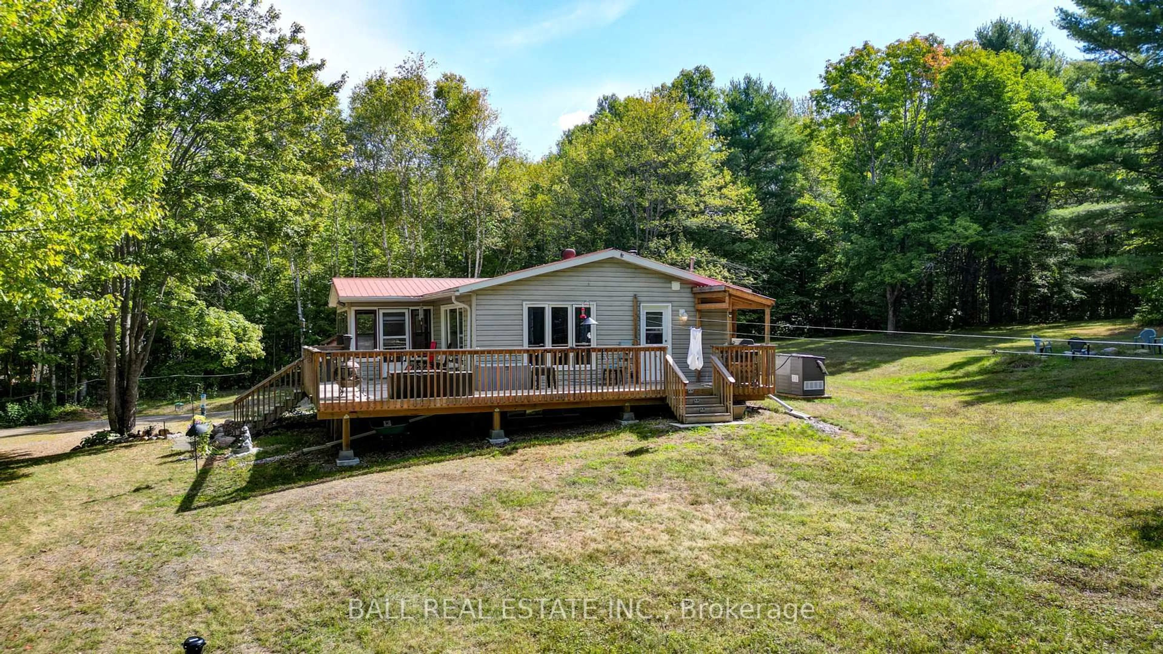 A pic from outside/outdoor area/front of a property/back of a property/a pic from drone, water/lake/river/ocean view for 27322 Highway 28, Bancroft Ontario K0L 1C0