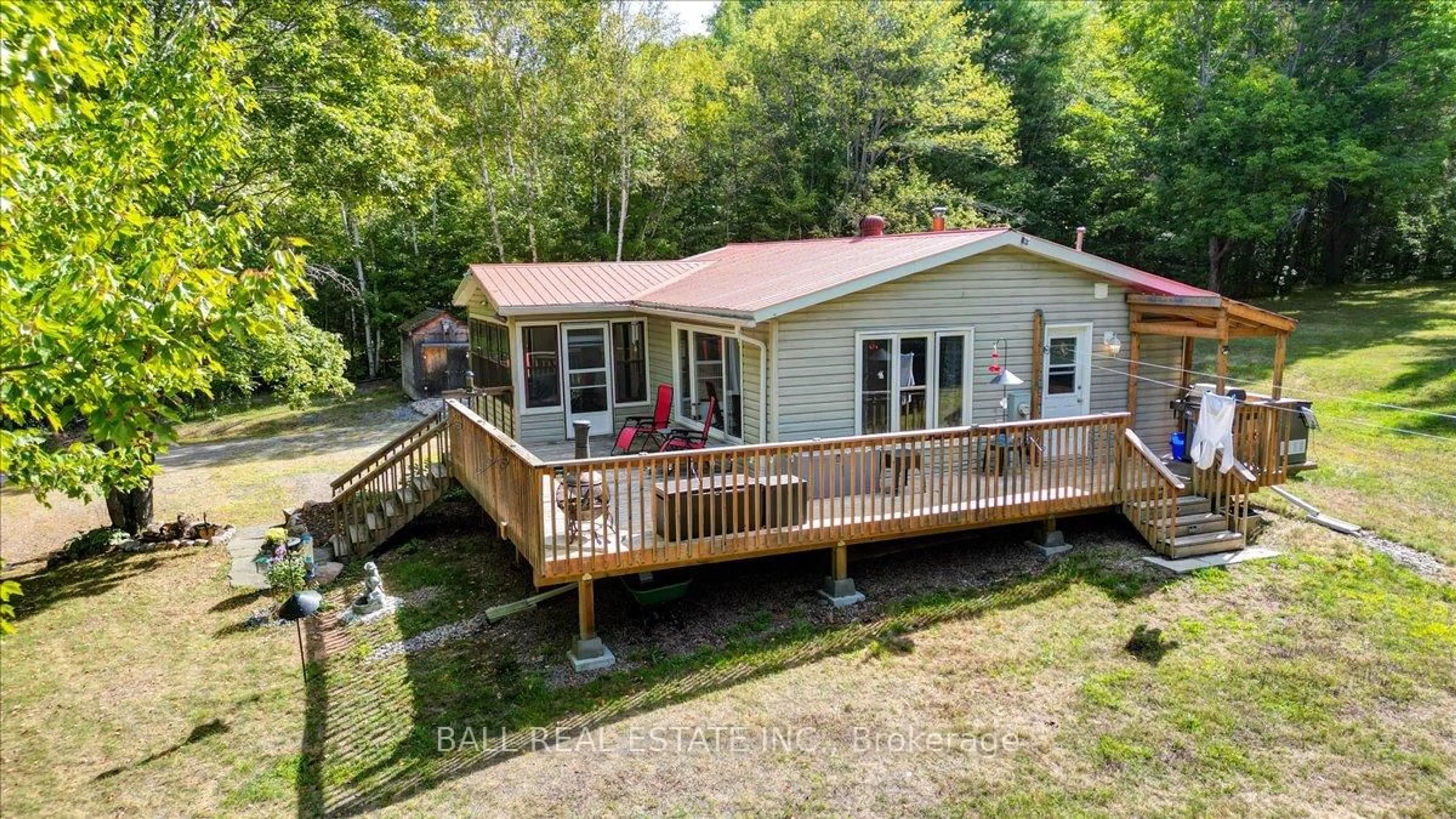 A pic from outside/outdoor area/front of a property/back of a property/a pic from drone, water/lake/river/ocean view for 27322 Highway 28, Bancroft Ontario K0L 1C0