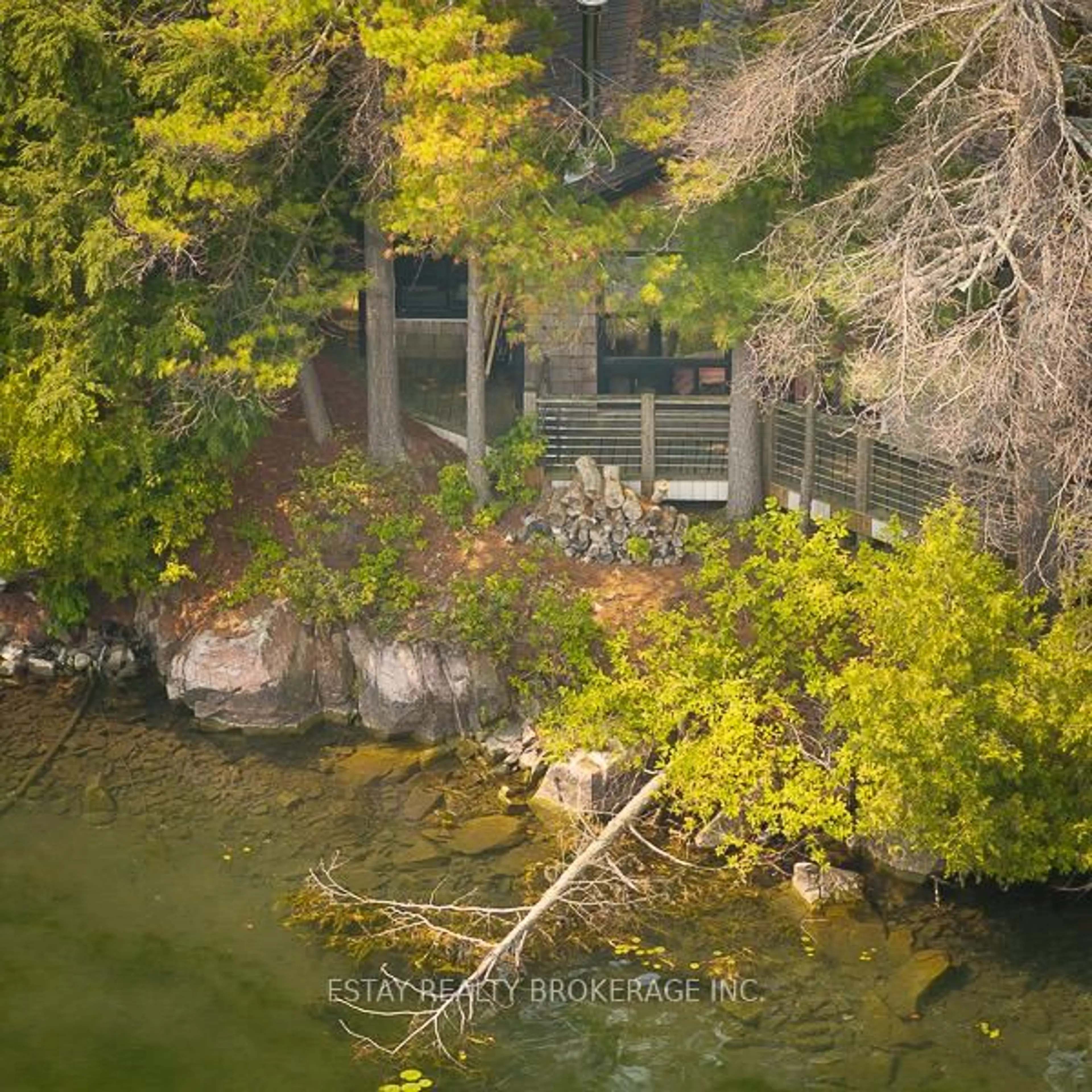 A pic from outside/outdoor area/front of a property/back of a property/a pic from drone, water/lake/river/ocean view for 1 Island 60, Lansdowne Ontario K0E 1L0