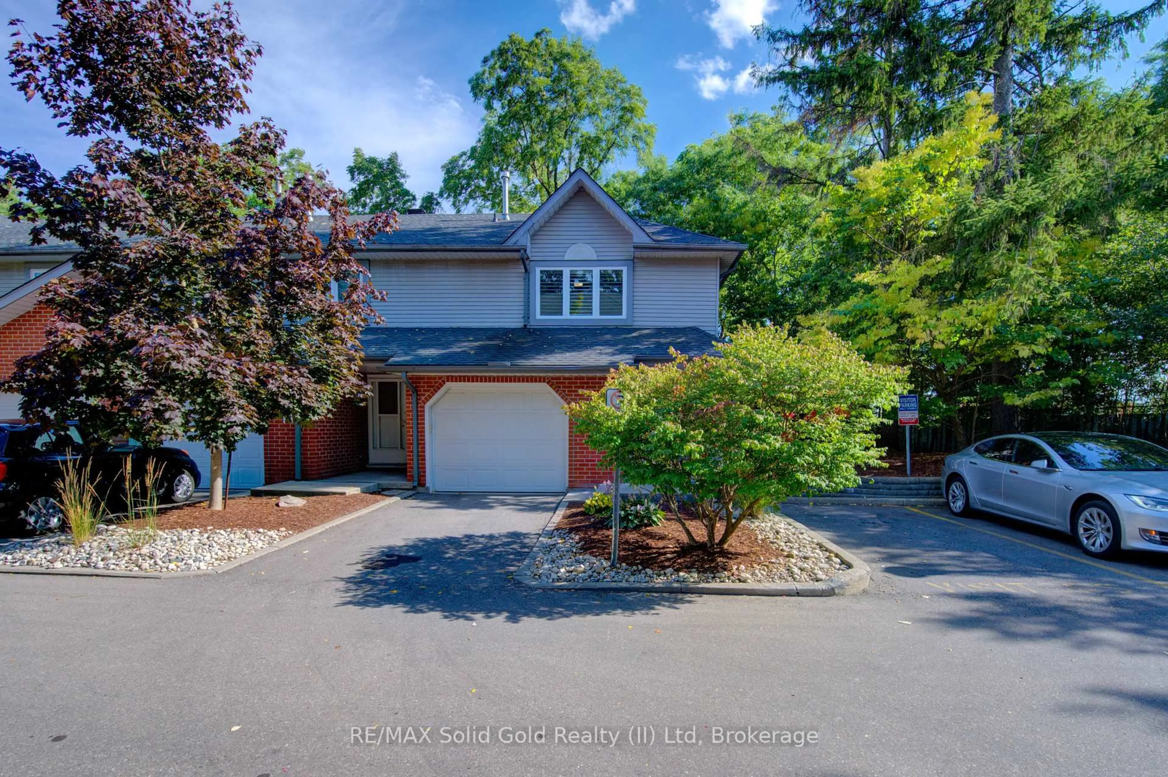 A pic from outside/outdoor area/front of a property/back of a property/a pic from drone, street for 89 Woolwich St #12, Waterloo Ontario N2K 1S5