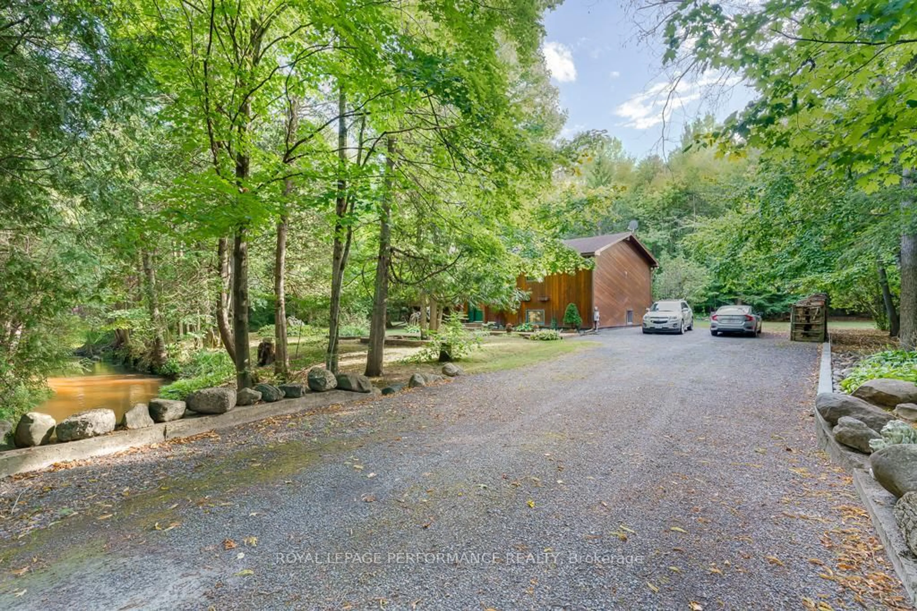 A pic from outside/outdoor area/front of a property/back of a property/a pic from drone, forest/trees view for 4720 Lawson Rd, South Stormont Ontario K0C 2A0
