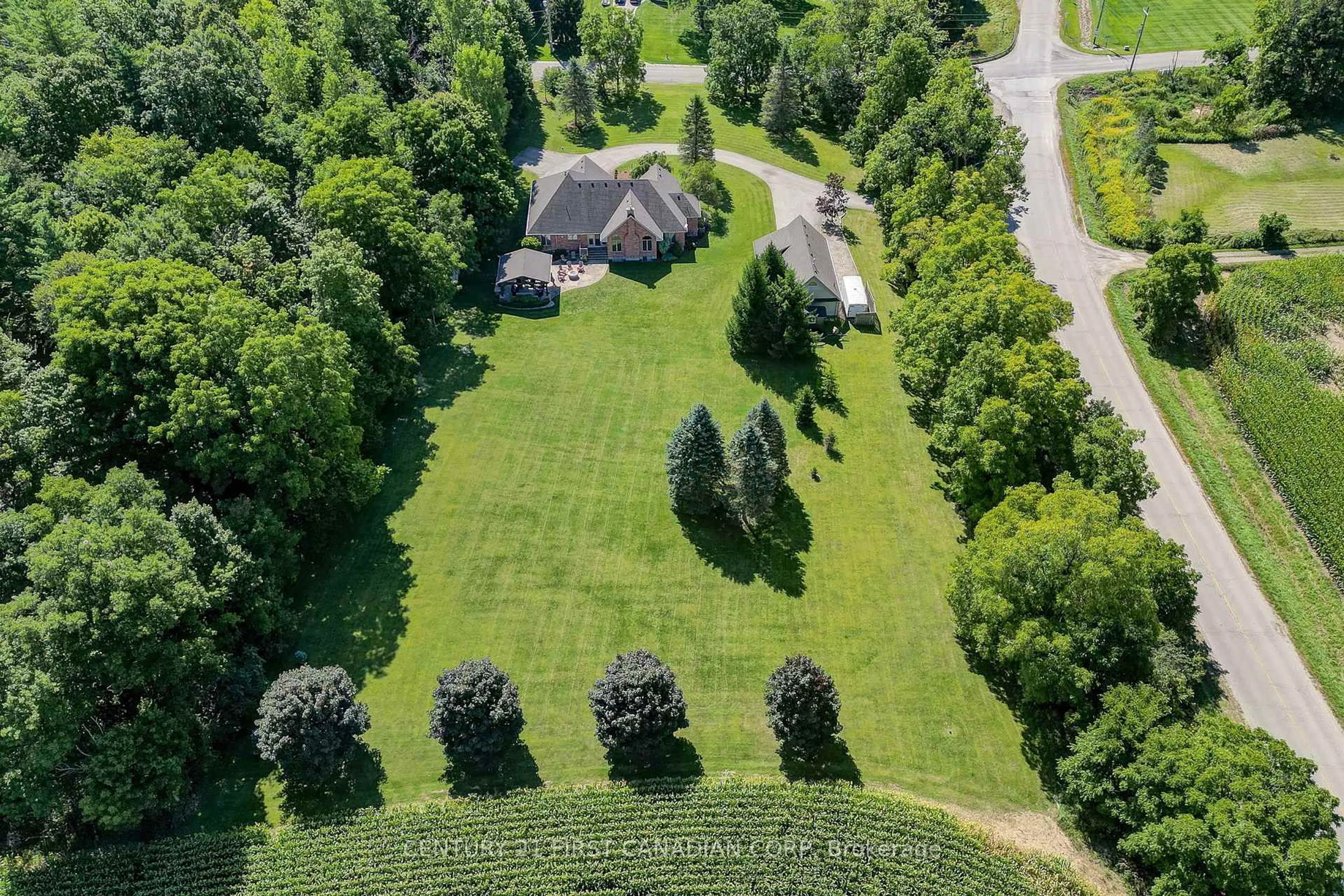 A pic from outside/outdoor area/front of a property/back of a property/a pic from drone, forest/trees view for 9430 Elviage Dr, London South Ontario N6K 4N5