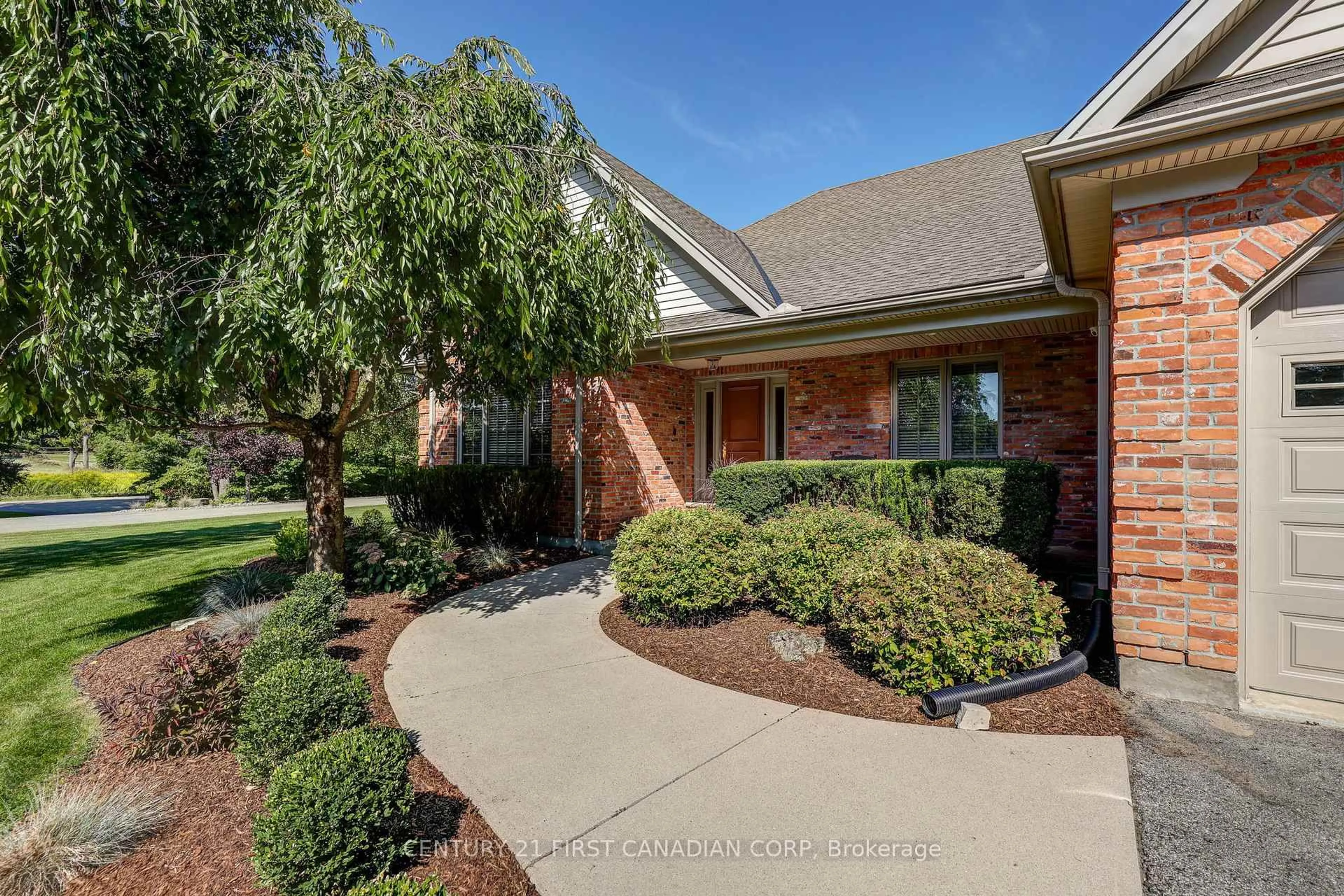 Home with brick exterior material, street for 9430 Elviage Dr, London South Ontario N6K 4N5
