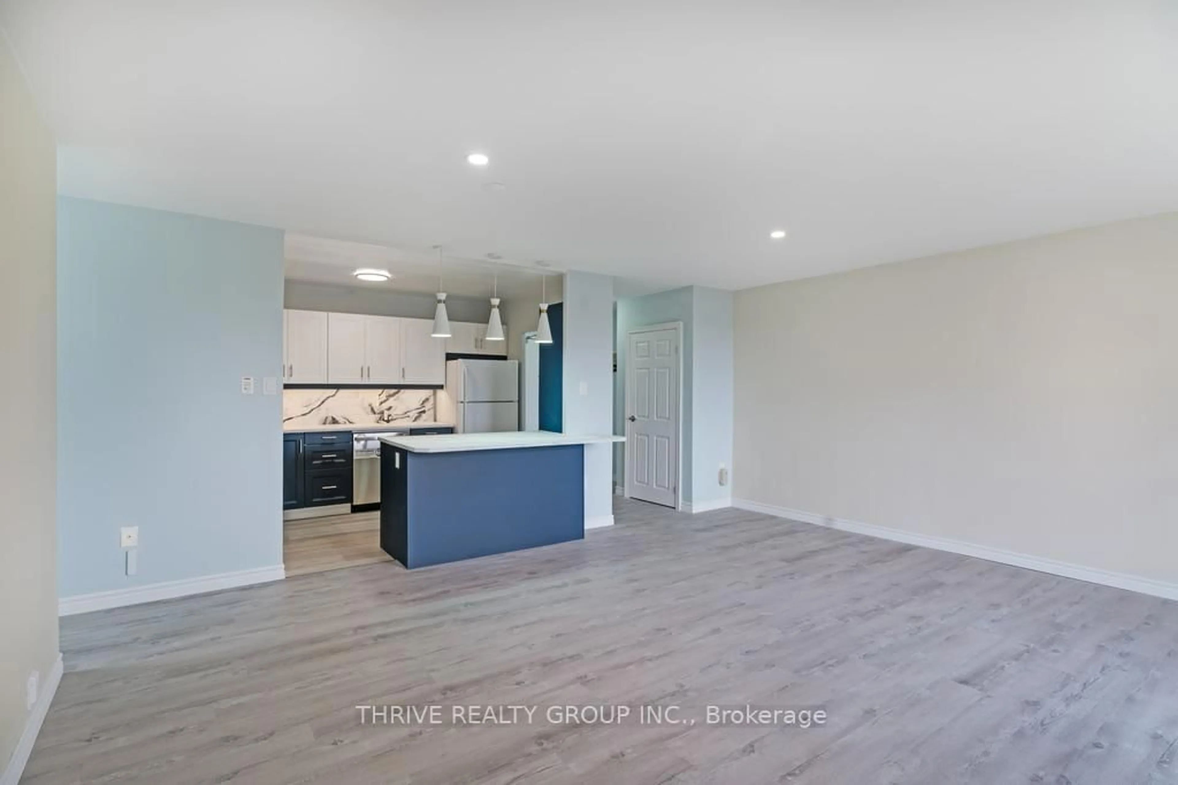 Open concept kitchen, wood/laminate floor for 563 Mornington Ave #610, London East Ontario N5Y 4T8
