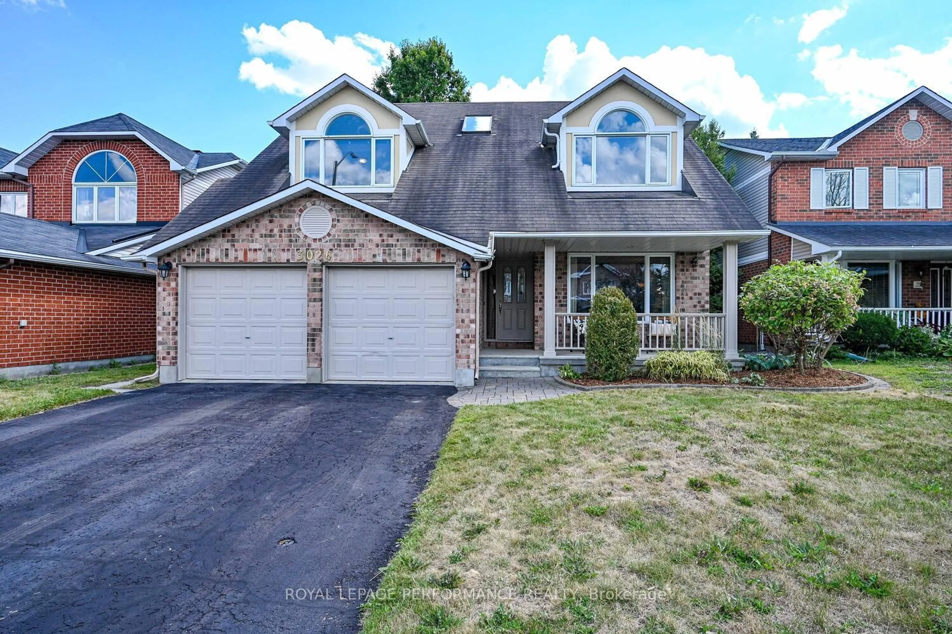 Home with brick exterior material, street for 3026 Sable Ridge Dr, Ottawa Ontario K1T 3R9