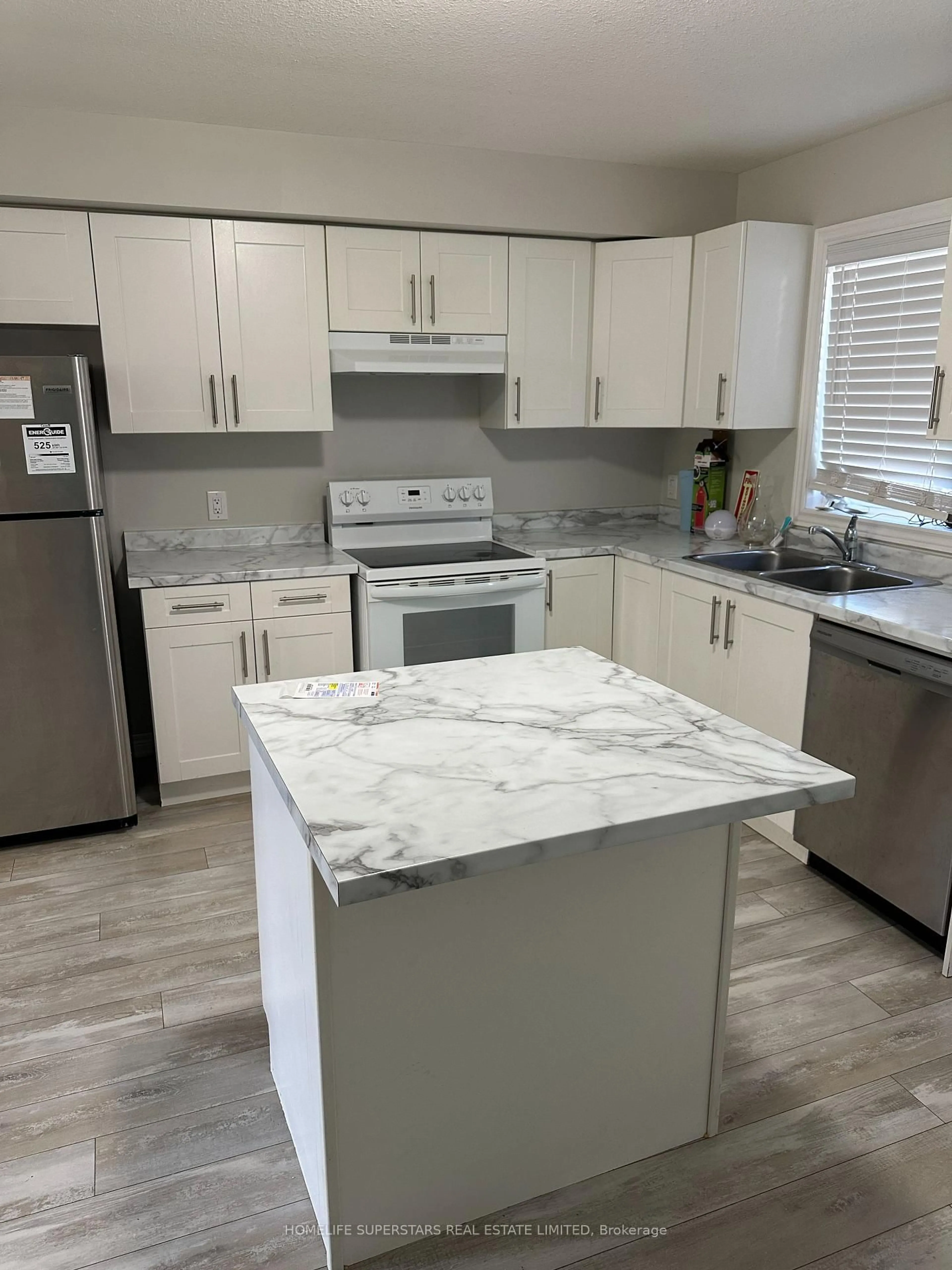 Open concept kitchen, ceramic/tile floor for 7768 Ascot Circ #51, Niagara Falls Ontario L2H 3P9