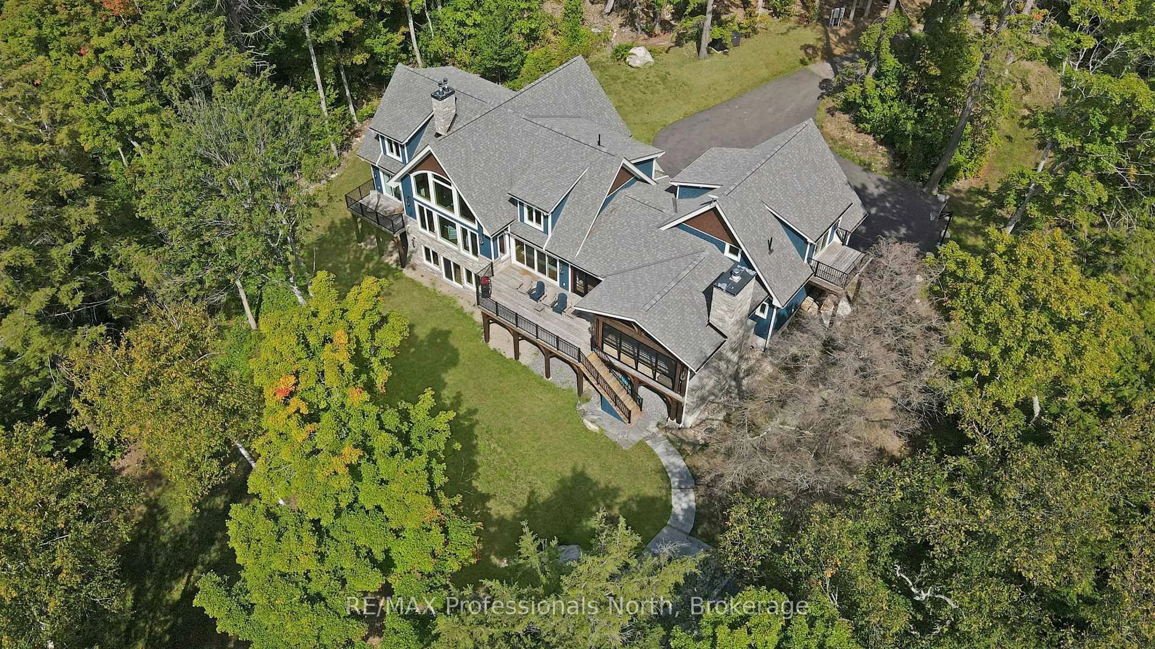 A pic from outside/outdoor area/front of a property/back of a property/a pic from drone, street for 1394 Flatwater Cove Tr, Dysart et al Ontario K0M 1S0