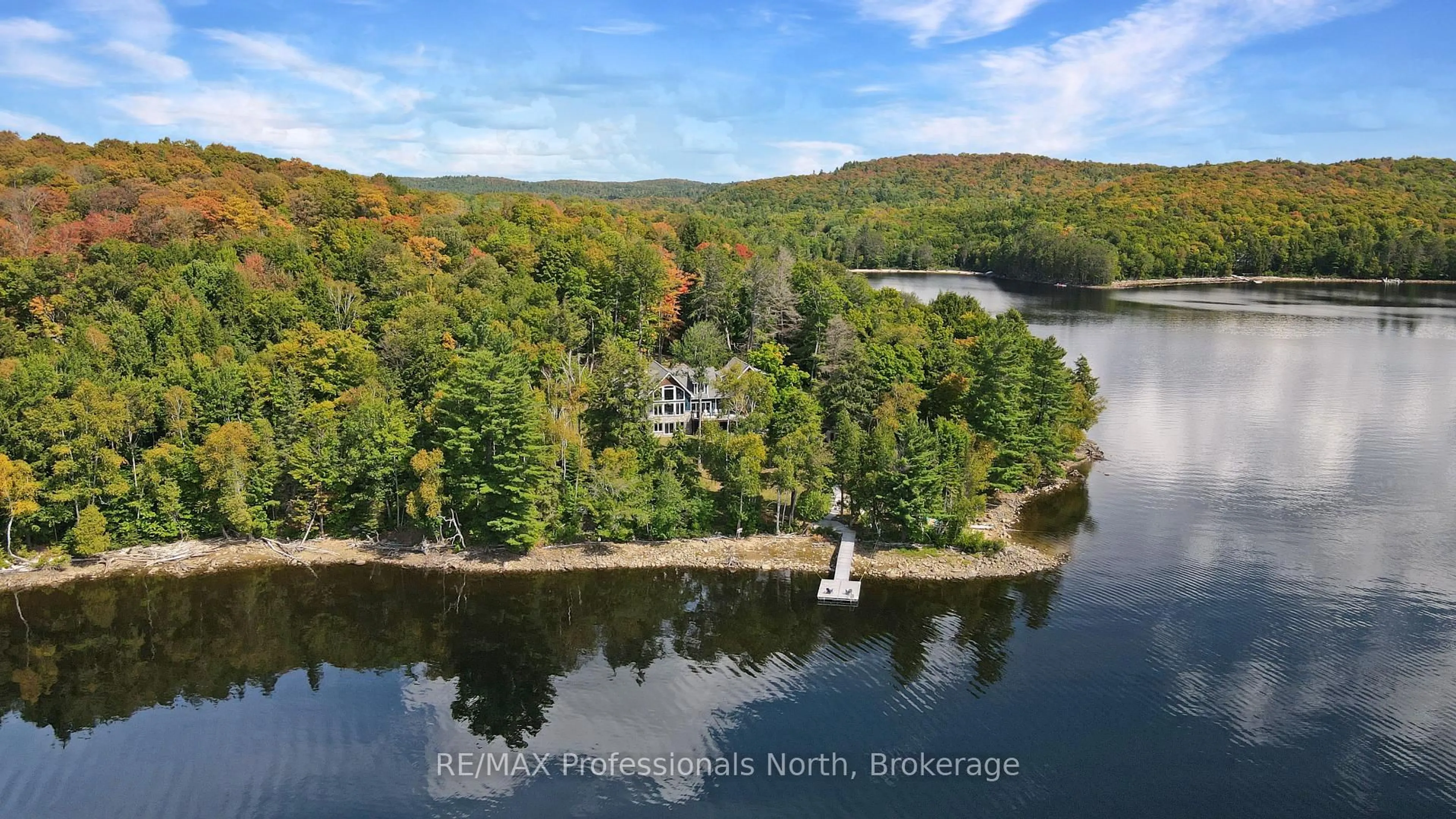 A pic from outside/outdoor area/front of a property/back of a property/a pic from drone, water/lake/river/ocean view for 1394 Flatwater Cove Tr, Dysart et al Ontario K0M 1S0