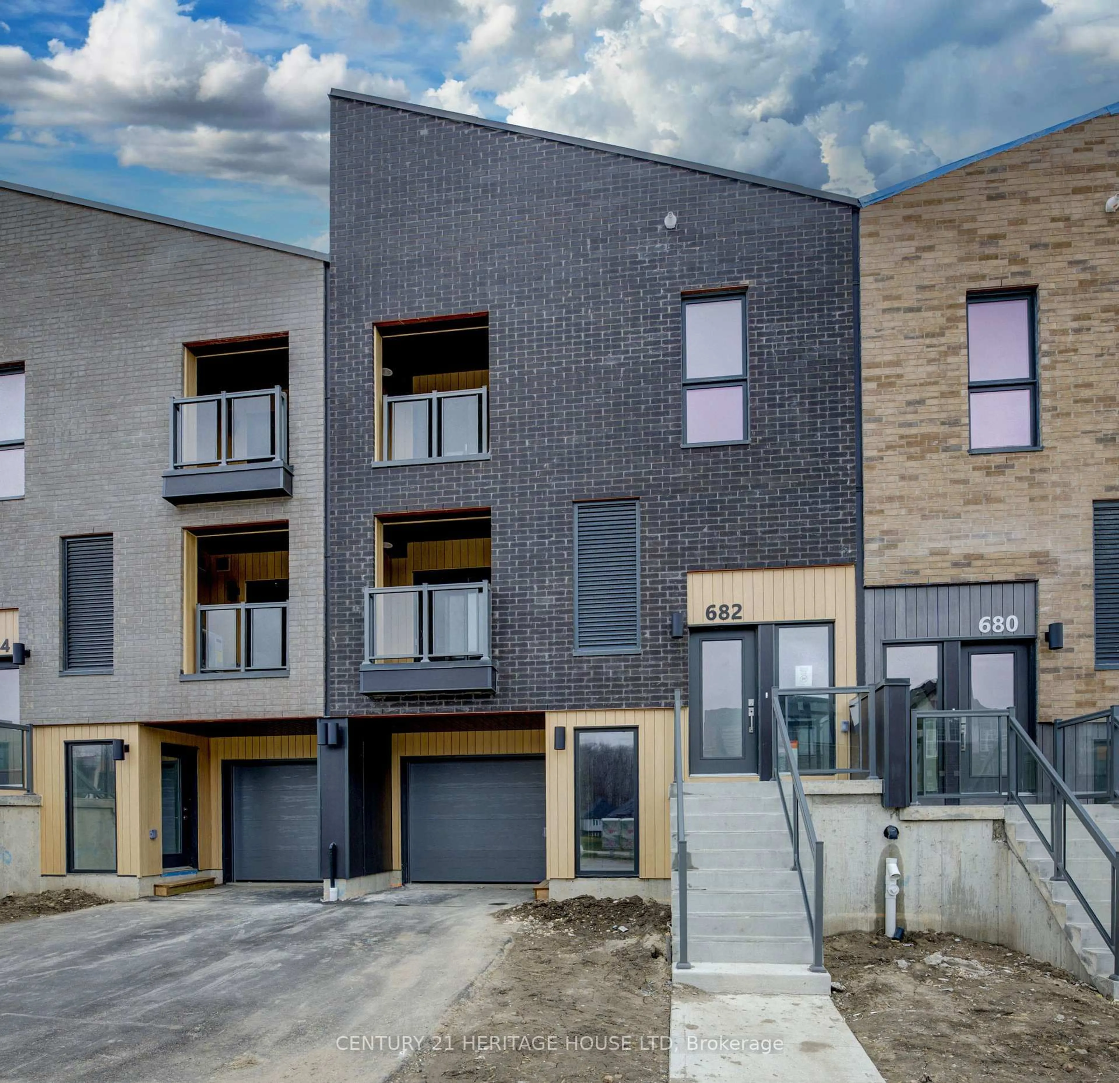 Home with brick exterior material, street for 682 Benninger Dr, Kitchener Ontario N2E 0J4