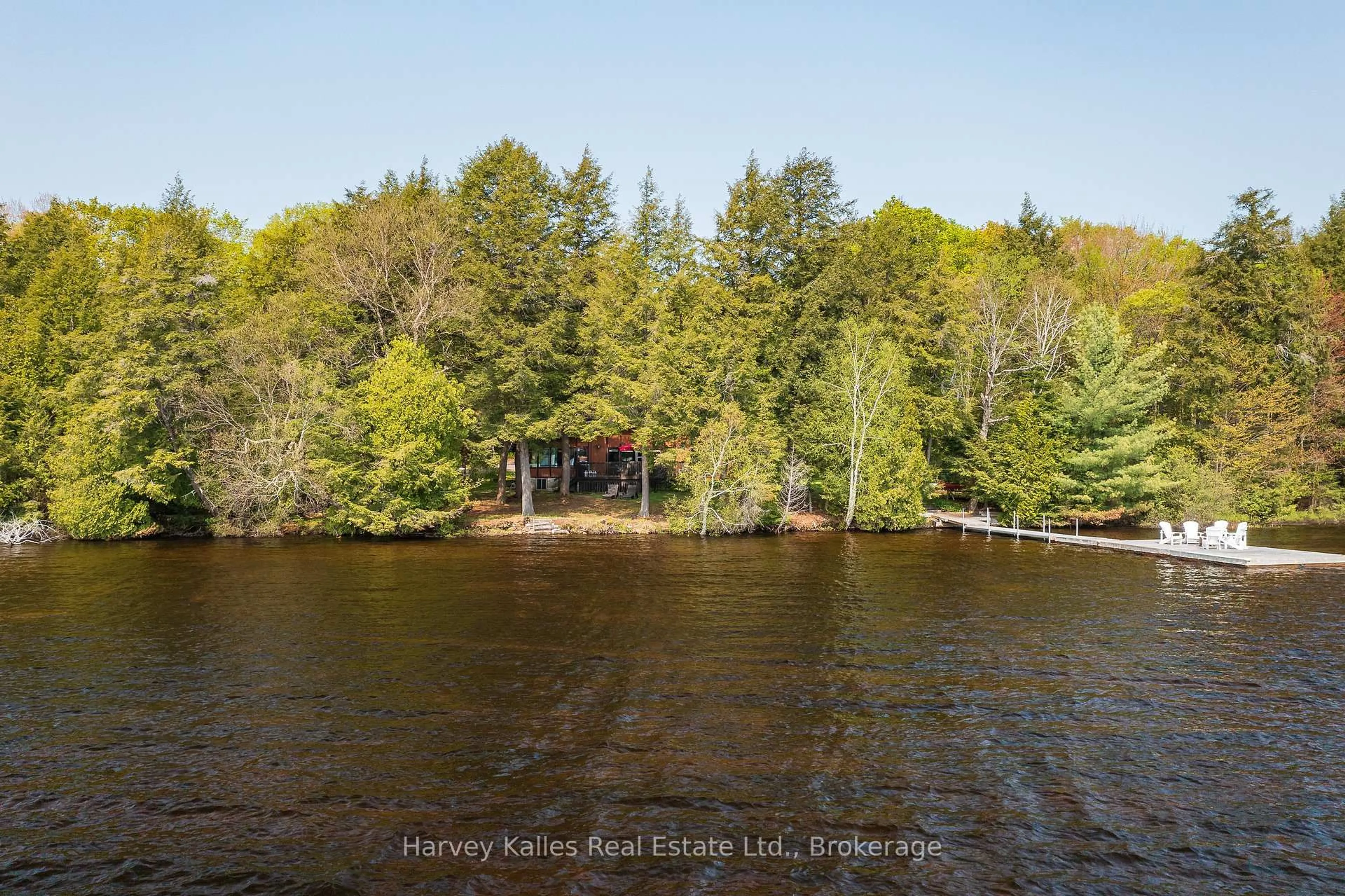 A pic from outside/outdoor area/front of a property/back of a property/a pic from drone, water/lake/river/ocean view for 1033 Scott Lane, Lake of Bays Ontario P1H 2J6