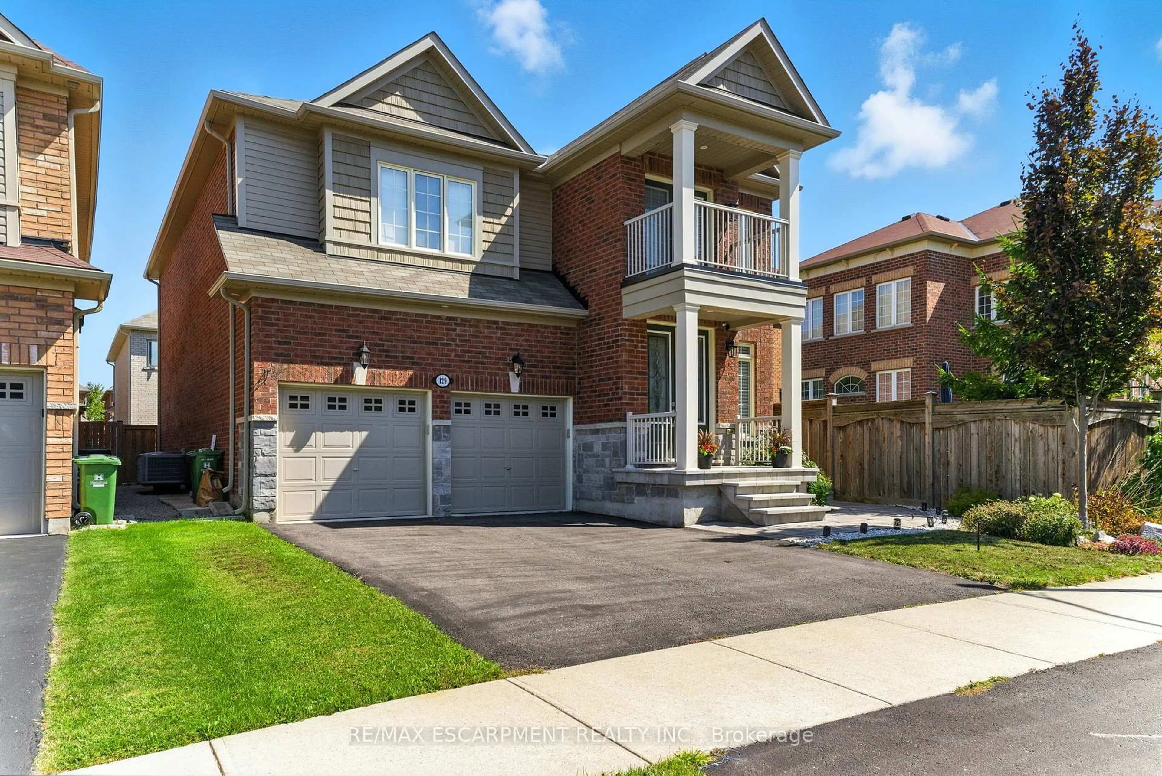 Home with brick exterior material, street for 129 Fingland Cres, Hamilton Ontario L8B 0S7