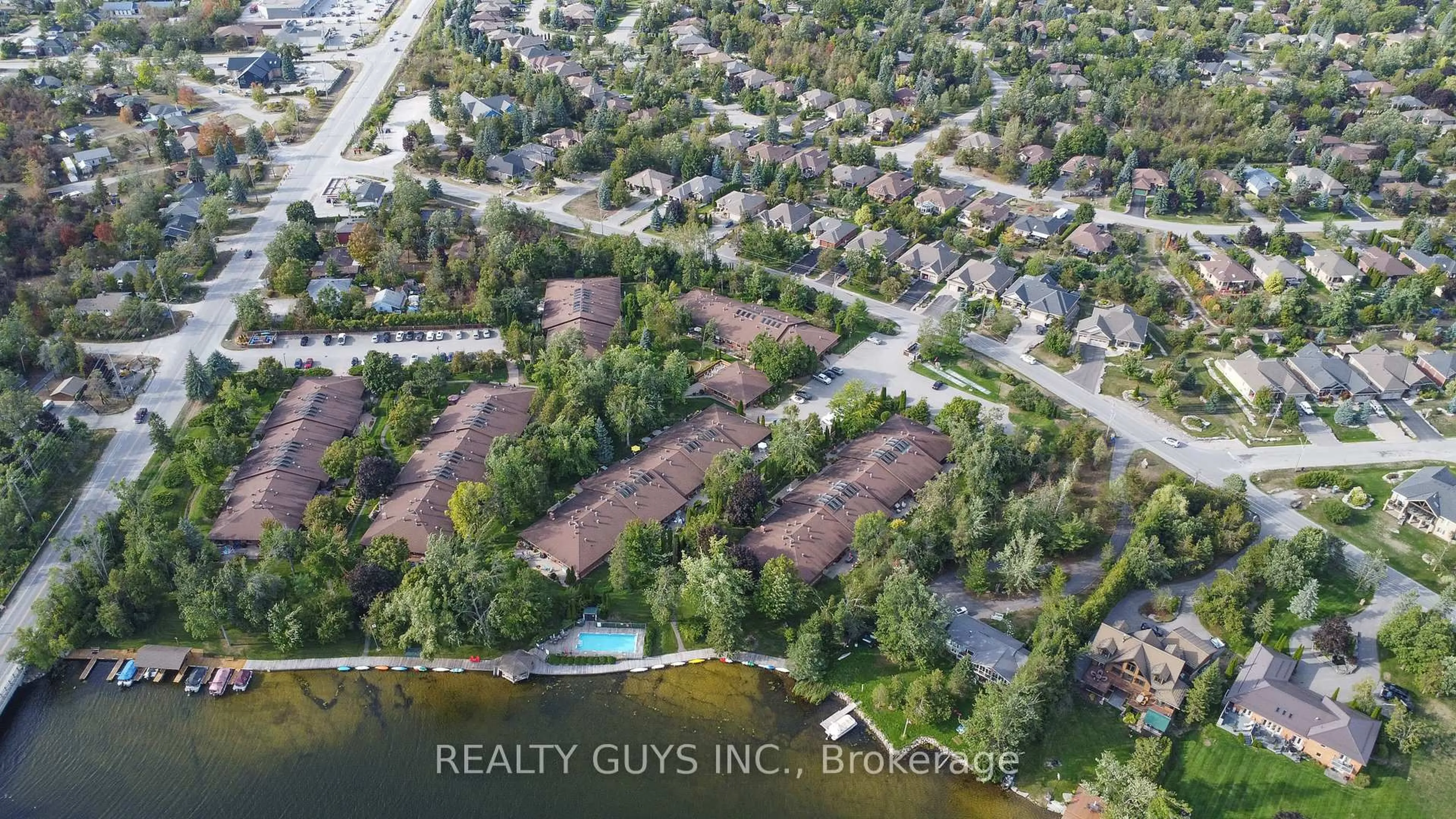 A pic from outside/outdoor area/front of a property/back of a property/a pic from drone, water/lake/river/ocean view for 200 EAST St ## 204, Kawartha Lakes Ontario K0M 1A0