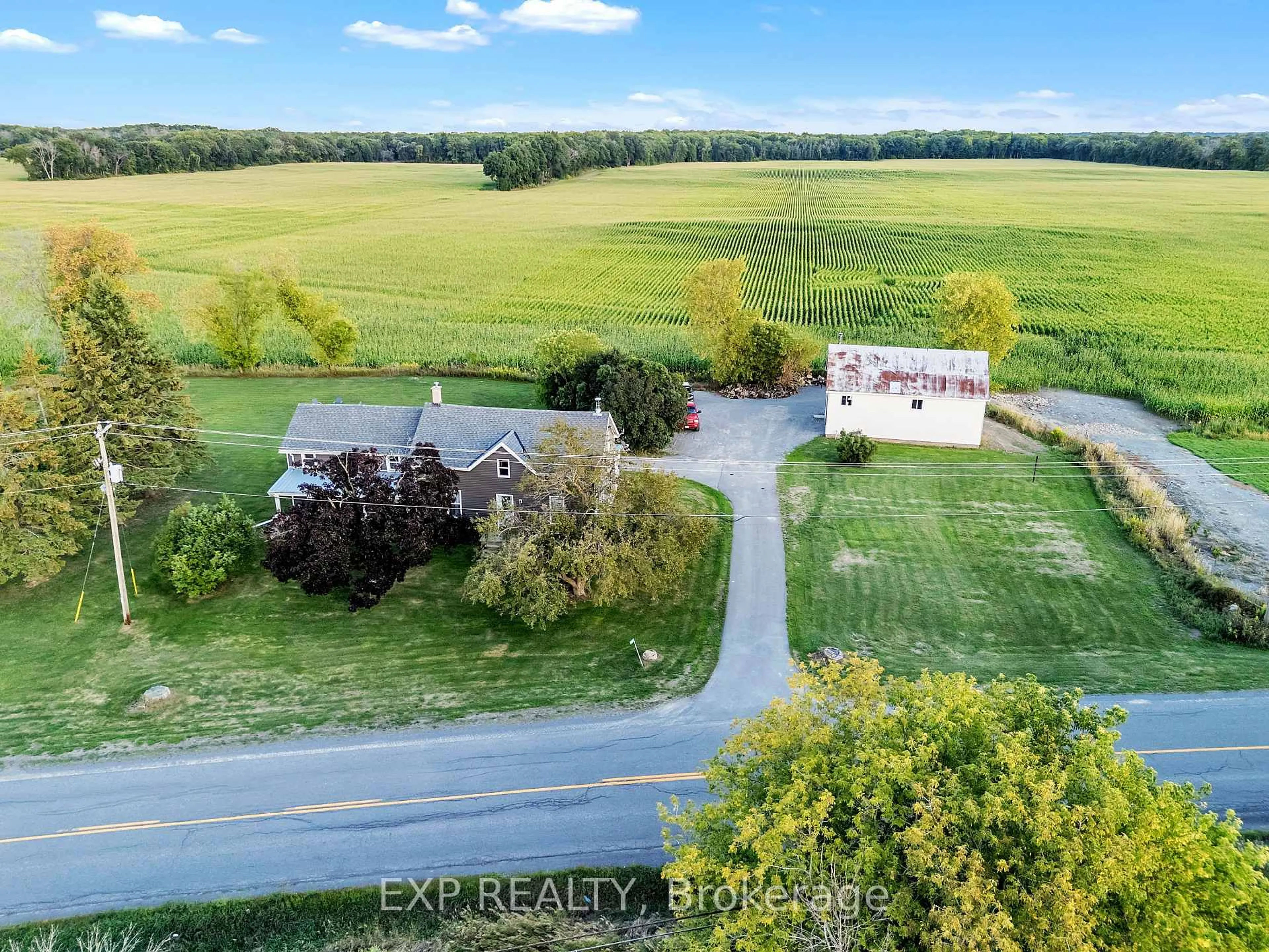 A pic from outside/outdoor area/front of a property/back of a property/a pic from drone, water/lake/river/ocean view for 5051 County Road 8, Napanee Ontario K7R 3K7