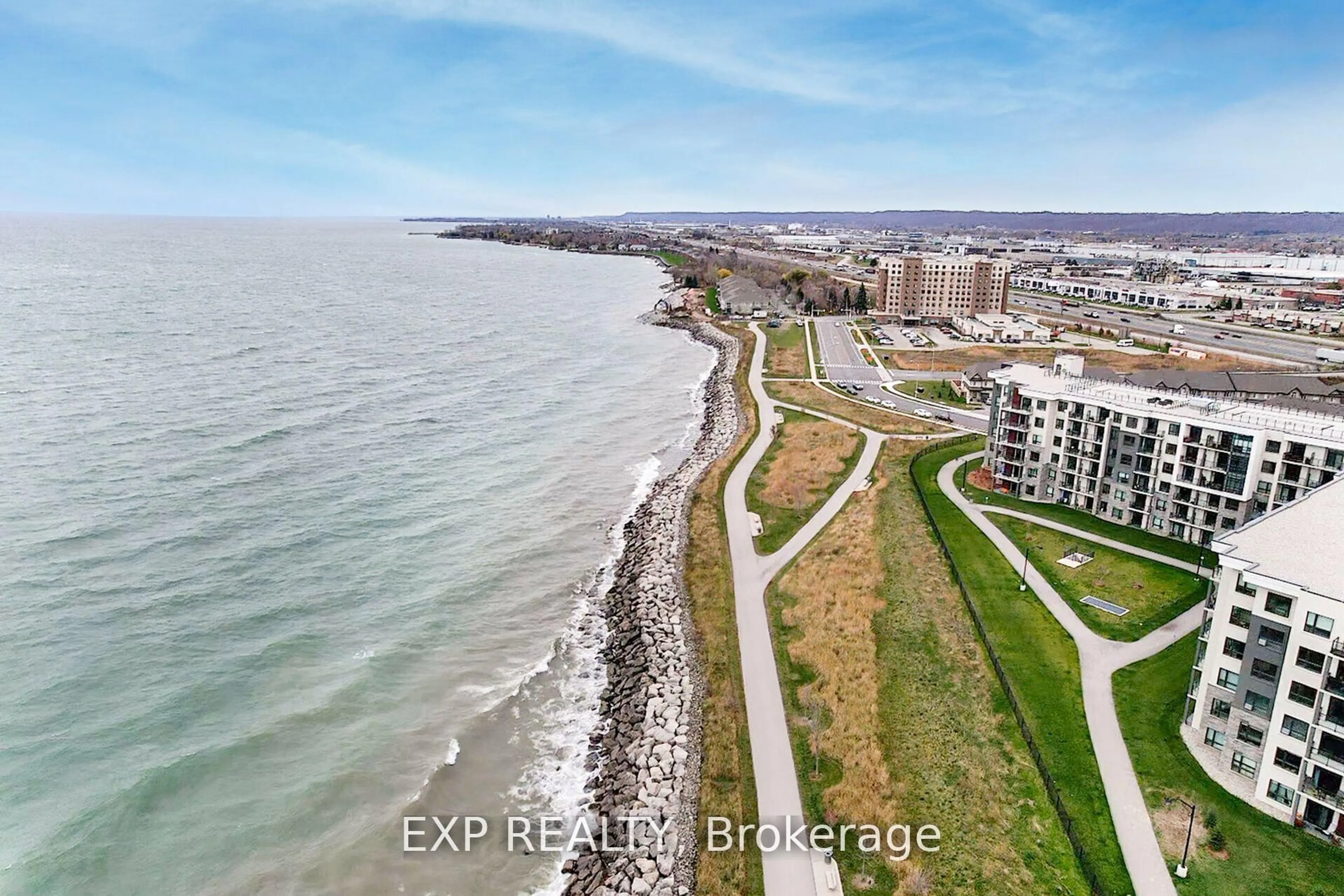 A pic from outside/outdoor area/front of a property/back of a property/a pic from drone, water/lake/river/ocean view for 125 Shoreview Pl #233, Hamilton Ontario L8E 0K3