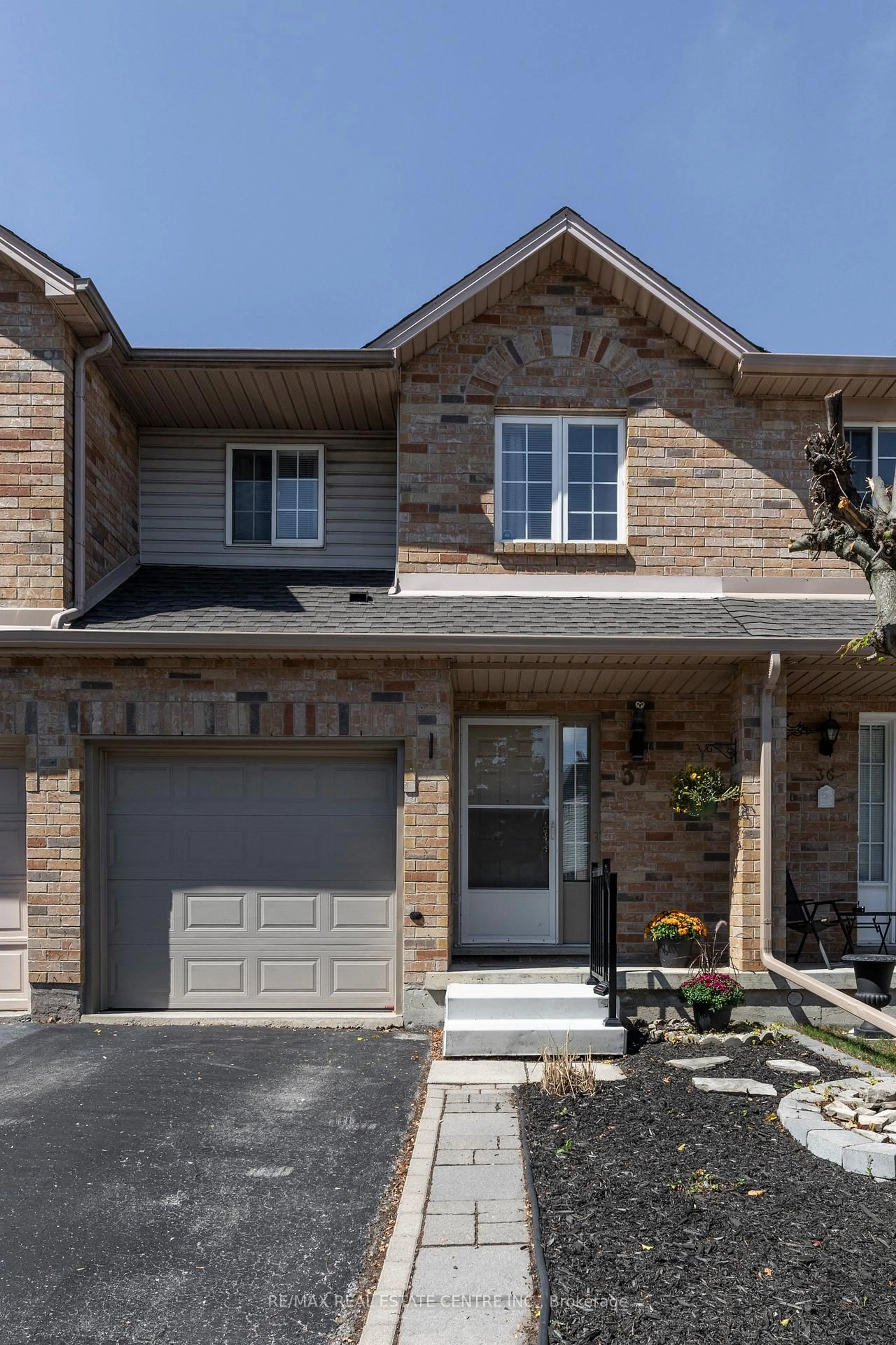 Home with brick exterior material, street for 10 Cadham Blvd #37, Hamilton Ontario L8W 3X6