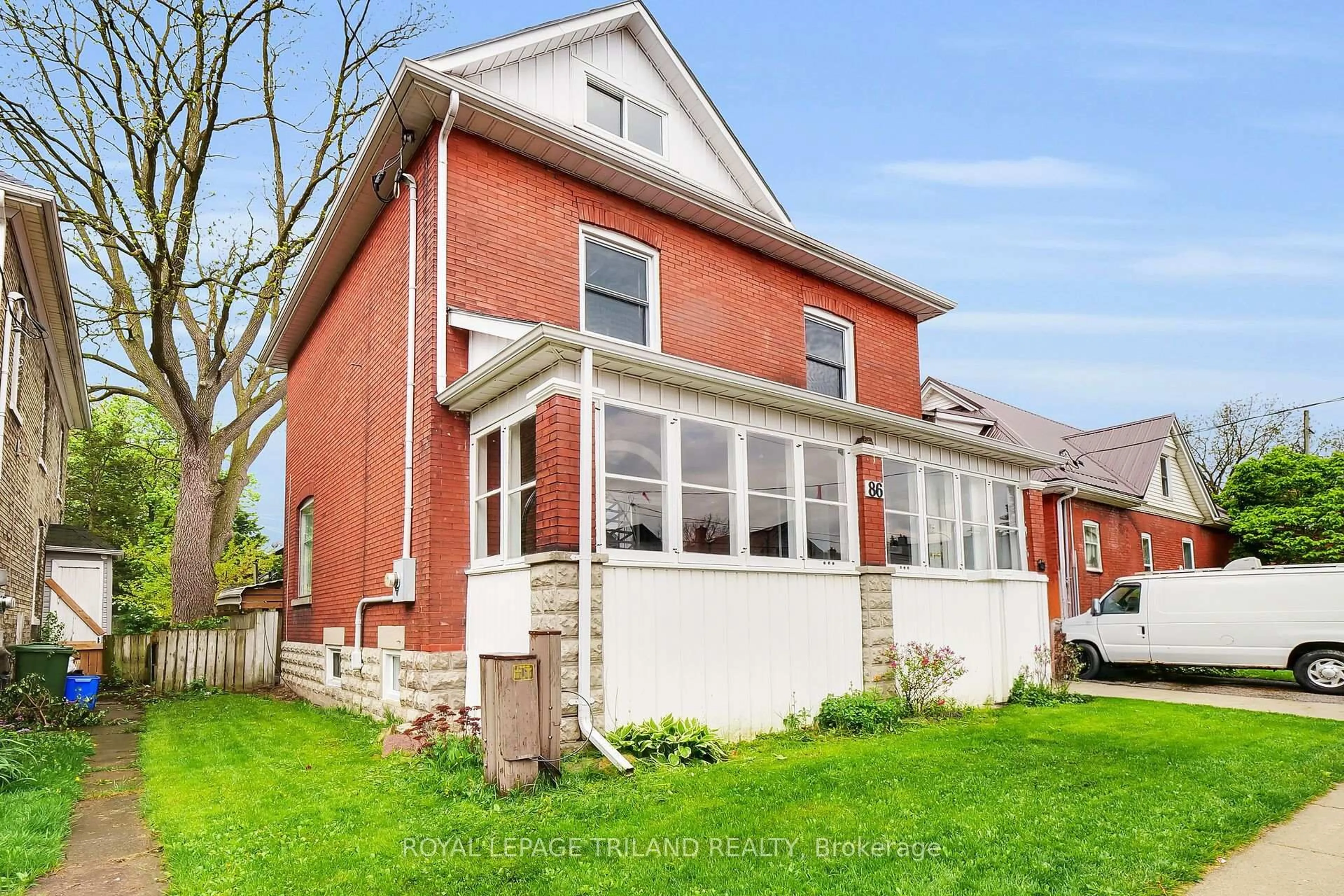 Home with brick exterior material, street for 86 Kains St, St. Thomas Ontario N5P 1N7