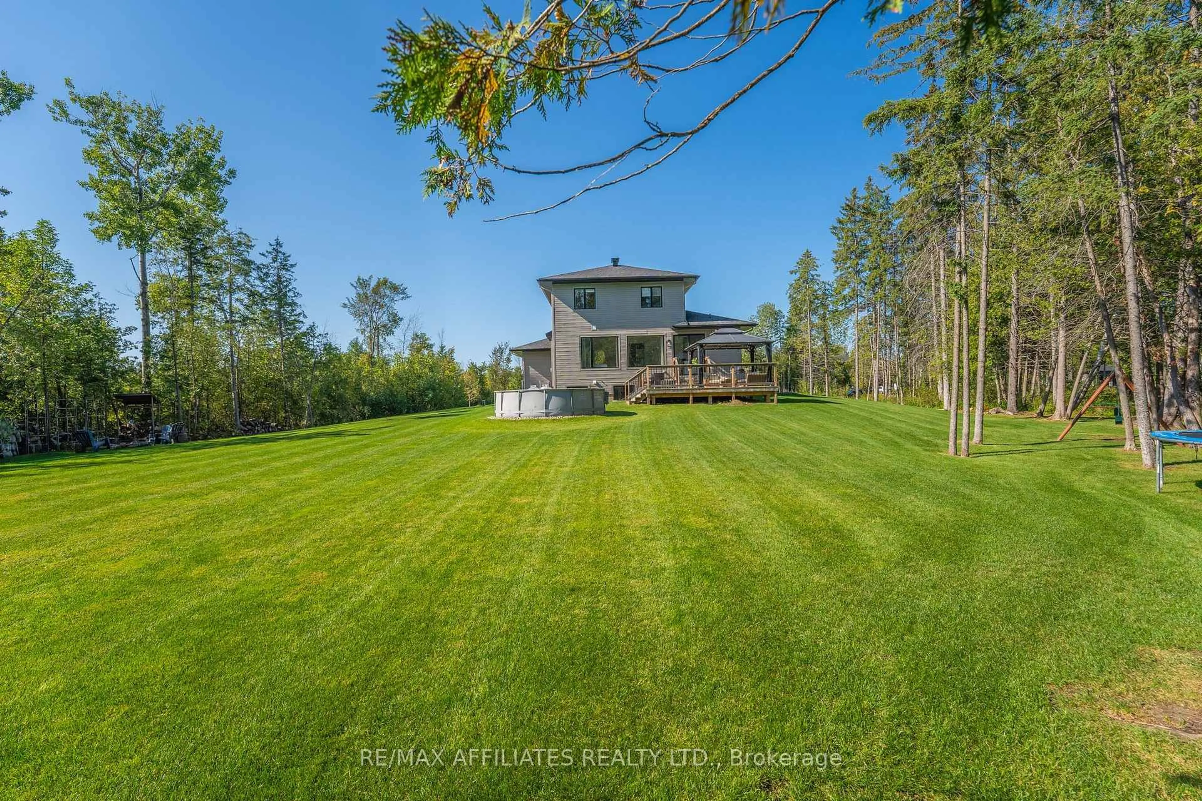 A pic from outside/outdoor area/front of a property/back of a property/a pic from drone, water/lake/river/ocean view for 325 RIDGEMONT Dr, Ashton Ontario K0A 1B0